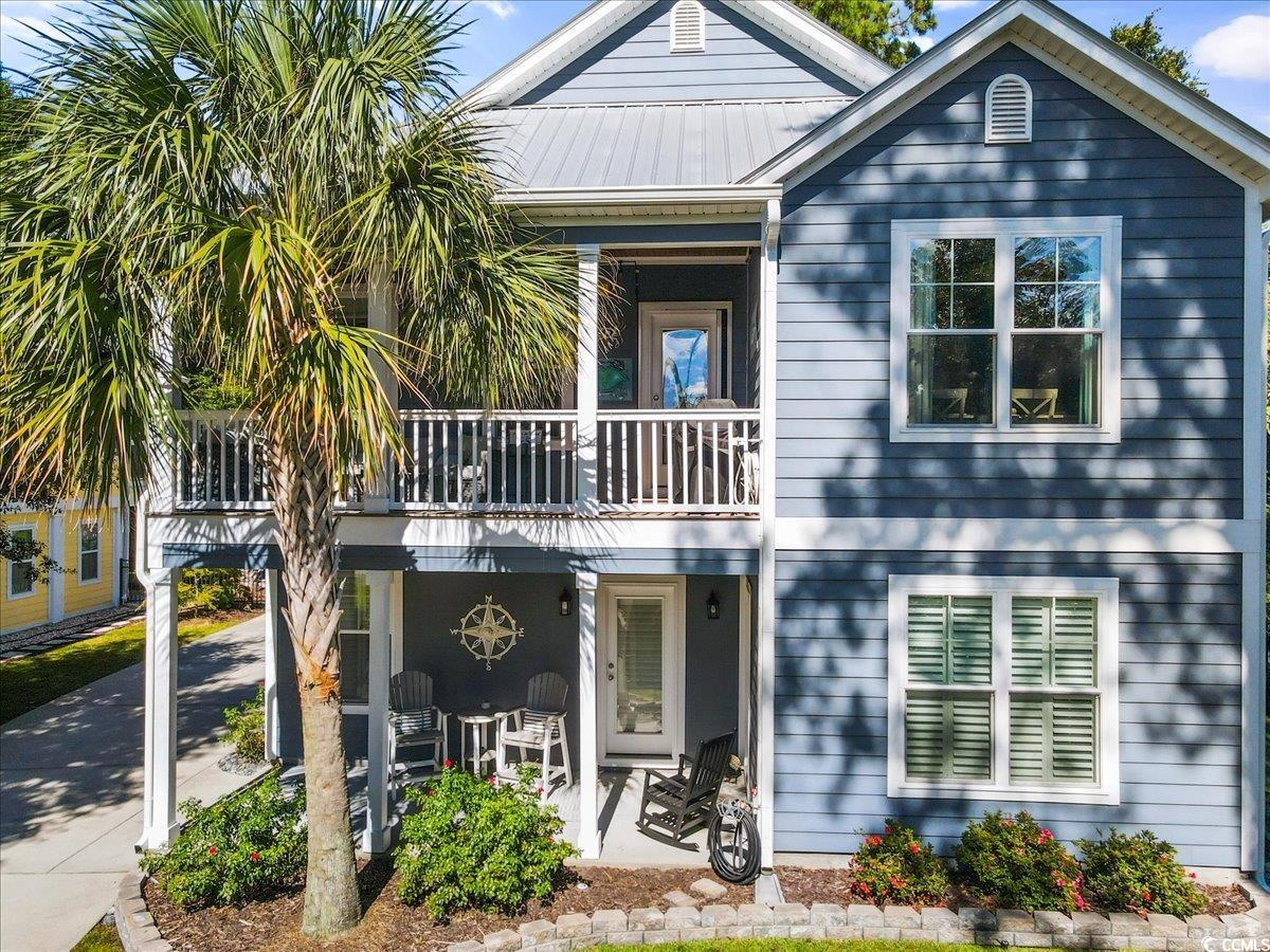 this beautiful, raised beach home sits in the heart of murrells inlet in the highly desirable creekside cottages neighborhood. as soon as you cross over the delightful personal bridge you will be captivated by the well-kept landscaping which includes the modern elegance of mexican beach pebbles and oyster shells. the back patio, with durable slate slab pavers, provides a lovely spot to enjoy your evening while admiring the serene uplighting and the enchanting palm trees. upon entering the home, you will be captivated with vaulted ceilings and an open living area which includes a wet bar with a wine cooler and a vent-less natural gas fireplace perfect for entertaining. the custom window treatments and plantation shutters bring coastal living to life. the inviting kitchen is fit for a chef with a natural gas stove and you are just steps away to the upstairs porch natural gas grill hookup for your dining pleasure. master bedroom is 18 x 12 to accommodate large furnishings and a sitting area. the master walk-in closet, just wow! it has all the adjustable storage and hanging areas to keep you well organized. the downstairs den/study/game room includes a partial kitchen with a sink, mini fridge, and microwave with direct access to the back patio through the stylish french doors. each first-floor bedroom has separate entrances to their rooms accessed from the front porch, which is especially nice for out-of-town guests. did i mention the location? you are just minutes from the marsh walk, public boat landing, brookgreen gardens, huntington state park, and dozens of amazing restaurants from pizza to fine dining. don't miss this opportunity to enjoy coastal living at the inlet in this fabulous home!
