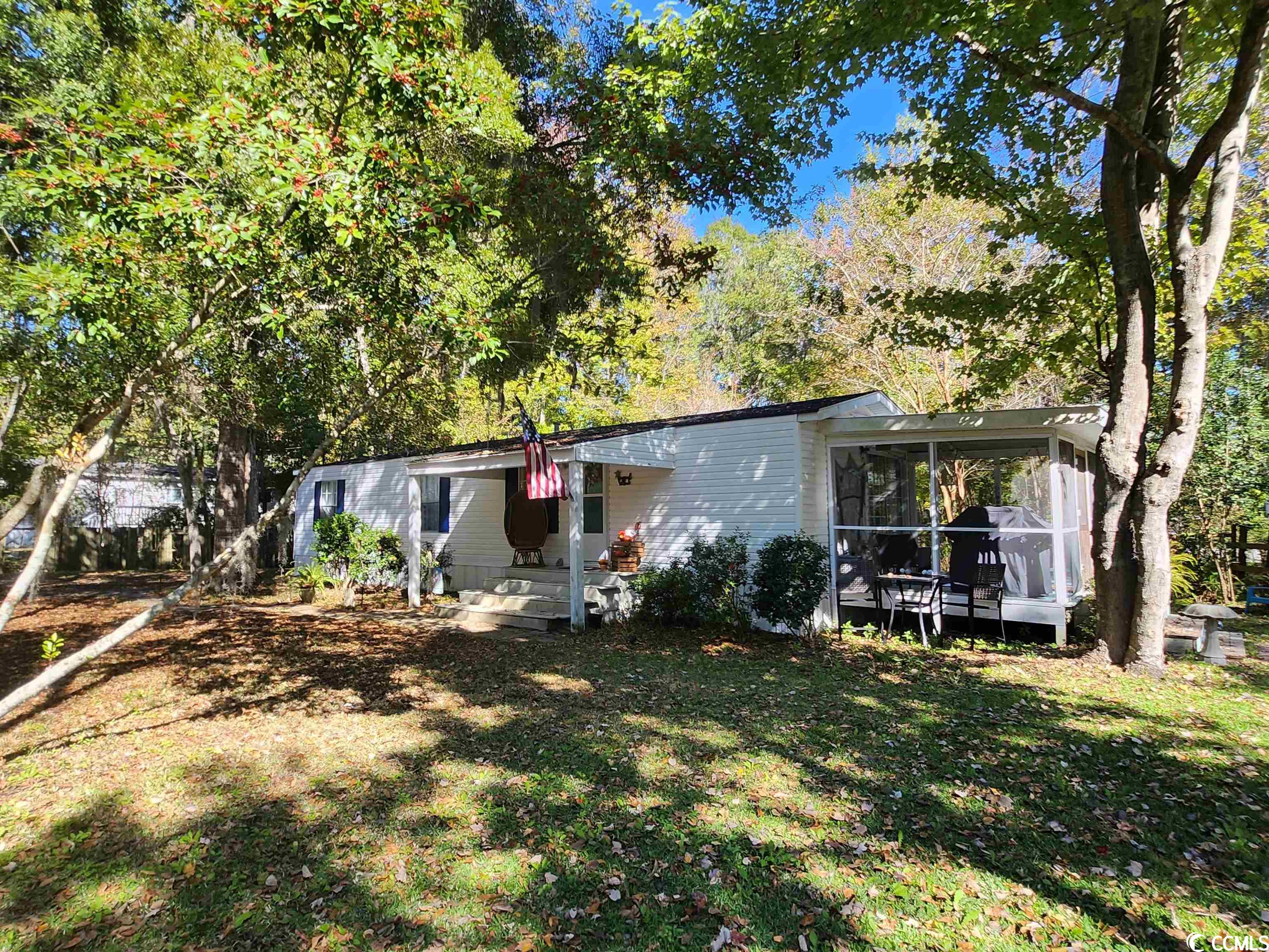 welcome home! centrally located in the heart of pawleys, this home is nestled in a quiet neighborhood on just under a half an acre with mature trees, including live oaks draped in spanish moss. relax with a book or enjoy coffee or cocktails on the 10x12 screened porch. remodeled, updated, and well-maintained, this home is move-in ready! everything included! close to churches, restaurants, shoppes/boutiques, numerous golf courses, and of course the beach!  (be sure to click on the virtual tour link to "walk through" the home.)