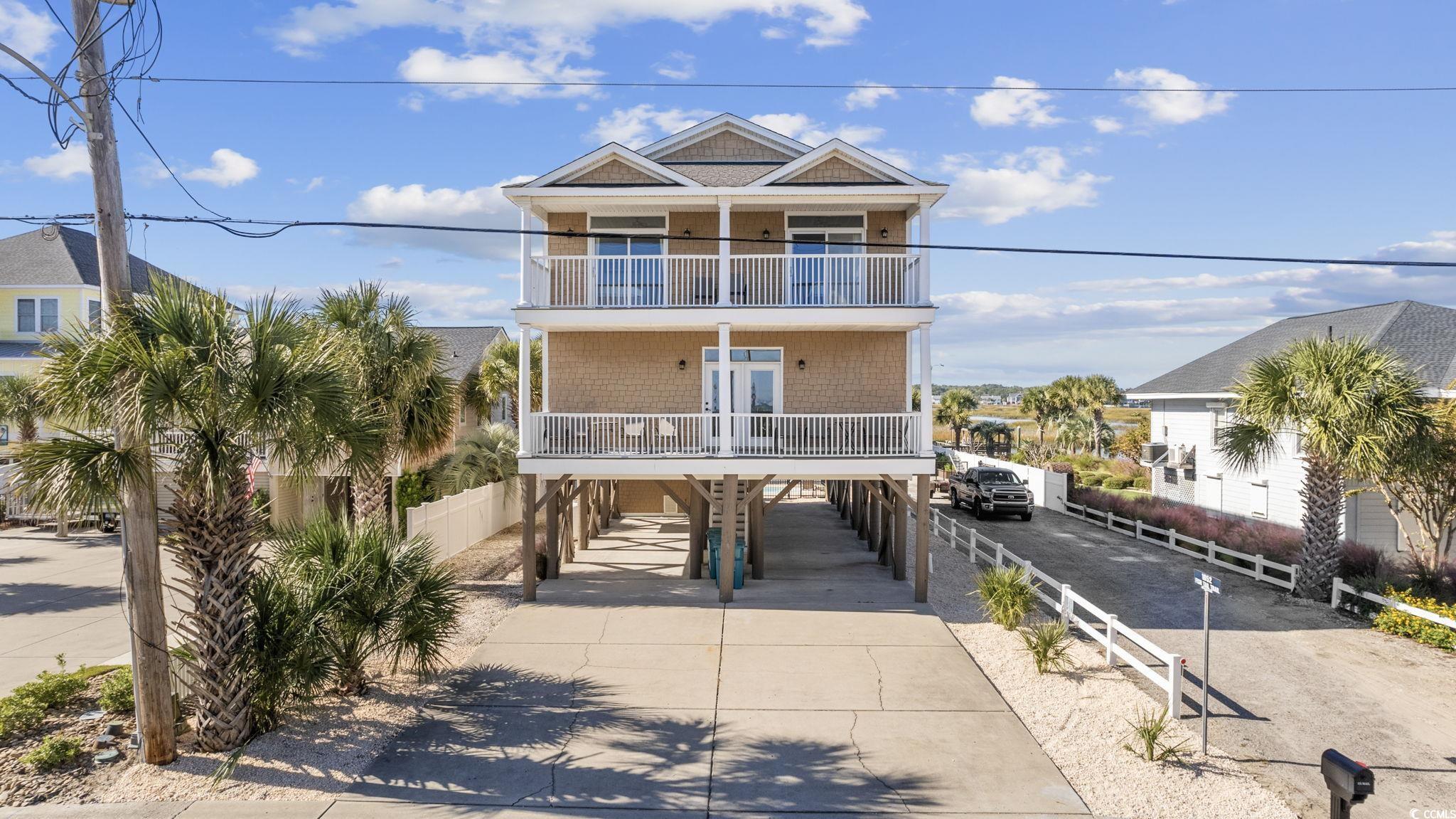 discover coastal living at its finest with this stunning property in garden city beach! nestled amidst picturesque landscapes, this remarkable home offers mesmerizing views of both the inlet and the ocean. the thoughtfully designed open-concept floor plan floods the space with natural light, creating an inviting and spacious ambiance throughout.  boasting seven generously sized bedrooms, each offering breathtaking views, along with five well-appointed bathrooms and an additional half bath, this property provides ample living space for you and your loved ones. recently replaced hvac systems, a new washer and dryer, and all-new furnishings, along with meticulous repainting, ensure your utmost comfort and convenience.  the outdoor area is equally impressive, featuring a private pool in the backyard, offering the ideal retreat for relaxation or entertaining guests. each bedroom offers a unique and awe-inspiring view, allowing you to bask in the beauty of your surroundings from multiple vantage points.  this property also presents a great investment opportunity, with weekly rentals bringing in over six figures a year. additionally, this year alone, the house is completely booked for the summer. being offered fully furnished, this home is ready for immediate occupancy, allowing you to promptly start enjoying all the luxury and comfort it affords. transform this residence into more than just a property—it's a sanctuary where you can live, unwind, and immerse yourself in the coastal splendor of garden city beach.