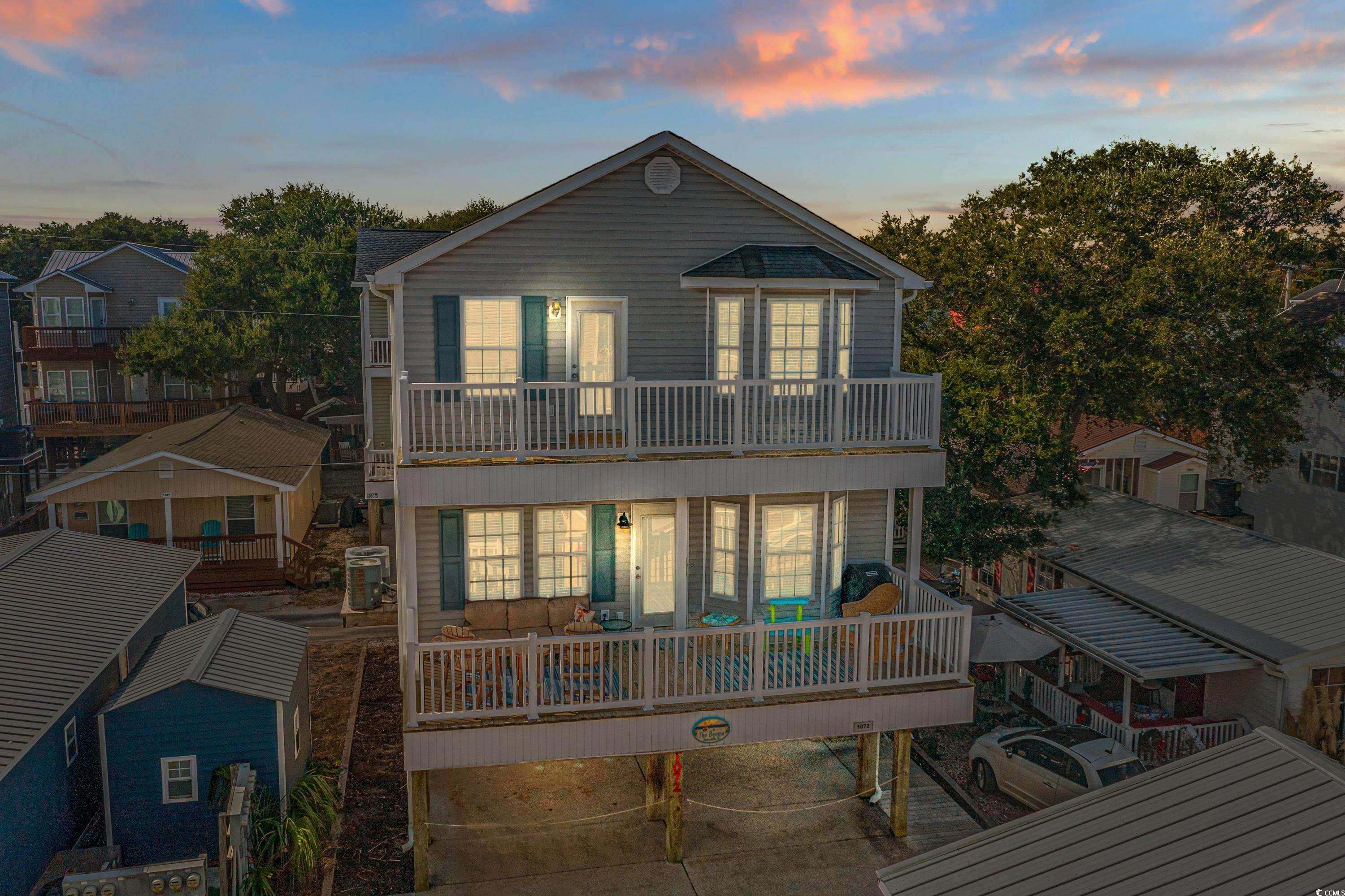 introducing your dream coastal retreat! this exquisite 5-bedroom, 3-bath raised beach house is the epitome of seaside luxury. nestled in the heart of the ocean lakes community, this stunning home offers the perfect blend of comfort and style. with spacious living areas and multiple balconies, you'll have ample space to entertain and savor breathtaking sunsets. relax in your private oasis, just a short walk from the shore, and make every day a beach day. don't miss your chance to live the coastal life you've always dreamed of – schedule a viewing today!