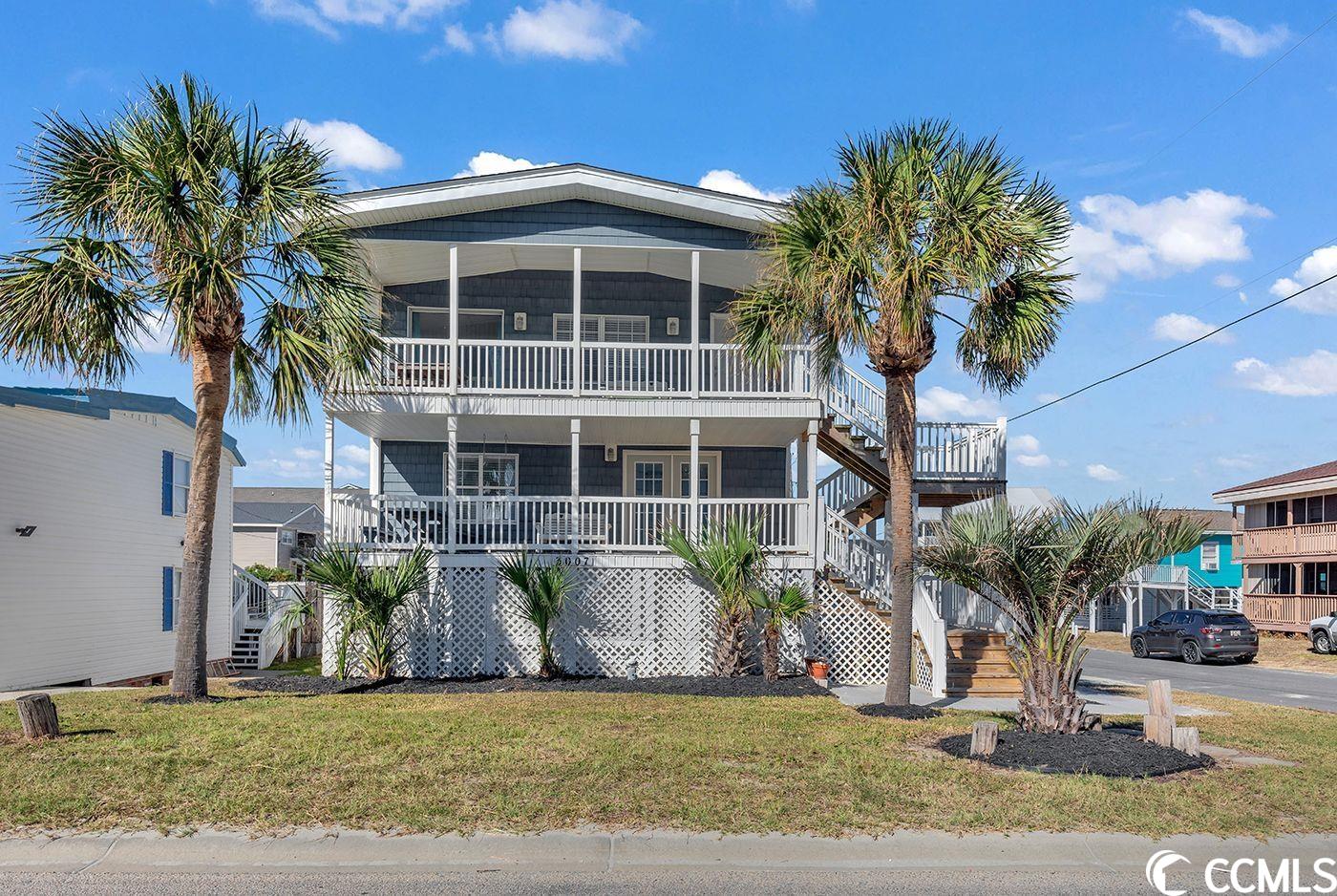 location is key!  second row raised beach cottage in the heart of the cherry grove section of north myrtle beach. the beach access is directly across the street and the home is within walking distance to shops, restaurants, beach bars, cherry grove pier and more! the home features 7 bedrooms and 4 full baths on 2 floors. there is a huge enclosed ground level space that features the laundry room and a shower along with a large storage area as well as parking. the plumbing for a full bath on the ground level has already been added. this comfortable raised beach home is laid out in a reverse floor plan with living spaces on both the first and second floor.  each floor walks out onto a large front porch each with a view of the ocean. the first floor features 4 bedrooms, the main living room with large flat screen tv and a large wet bar with sink and small refrigerator with extra counter space that flanks an entire wall. the second floor offers 3 more bedrooms, a fully equipped kitchen and dining room as well as the primary bedroom.  there is a huge enclosed ground level space that features the laundry room and a shower along with a large storage area as well as parking for the home. the plumbing for a full bath on the ground level has already been added. the cottage is directly across the street from the ocean where you can spend the day enjoying cherry grove’s renowned beach.  you are also a short walk to the salt marsh where you can fish for flounder and blue crab. once the day is done cap it off with fresh fish or steaks off the grill.   home is very well priced based upon the other active second row north myrtle beach homes and is priced below the tax assessed value.