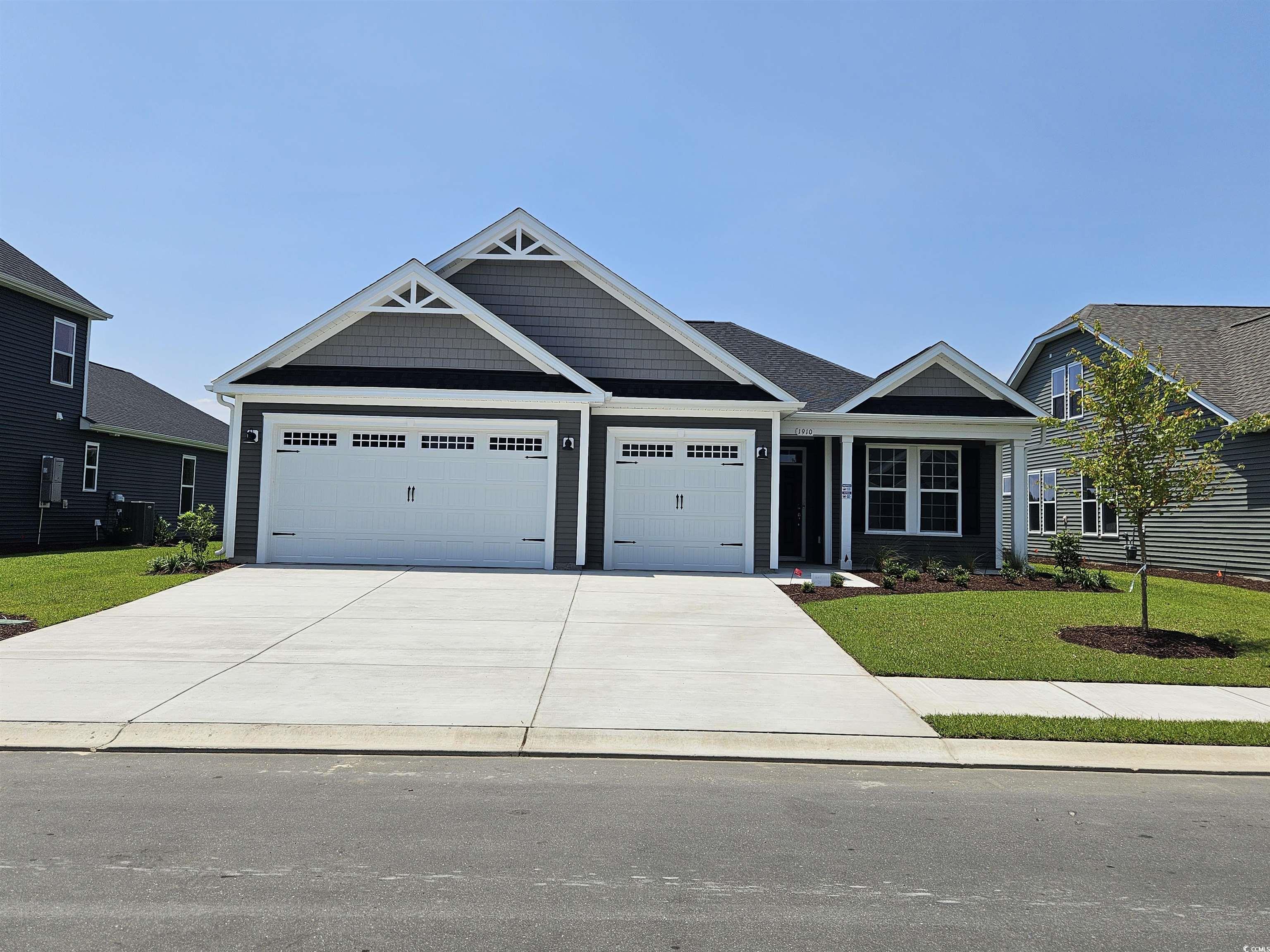 introducing the wave crest - the ultimate floor plan for those craving space and style! picture this: a three-car garage, a charming covered front porch, and a morning routine that starts with sipping coffee and preparing for an incredible day ahead. as you step into the home, you're greeted by a grand foyer and a study on the left. the heart of the home reveals a spacious dining room, perfectly situated next to the conveniently designed kitchen. and speaking of kitchens, this one boasts ample counter space and storage, complete with a walk-in pantry. enjoy easy entertaining and relaxing nights at home with the open floor plan of this stunning residence. the spacious great room and breakfast nook, just beyond the kitchen, provides the perfect setting. take in breathtaking south carolina sunsets from the comfort of your covered rear porch as you grill out or simply unwind with the gentle ocean breeze.  the front of the home features two bedrooms with walk-in closets and a full bathroom. the convenient drop zone offers ample storage space for your beach gear and is conveniently located next to the pass-through laundry room. saving the best for last, the owner's suite bedroom is a luxurious retreat boasting a tray ceiling and an enormous walk-in closet. relax in the spa-like owner's bathroom featuring a private water closet and double sink vanity.