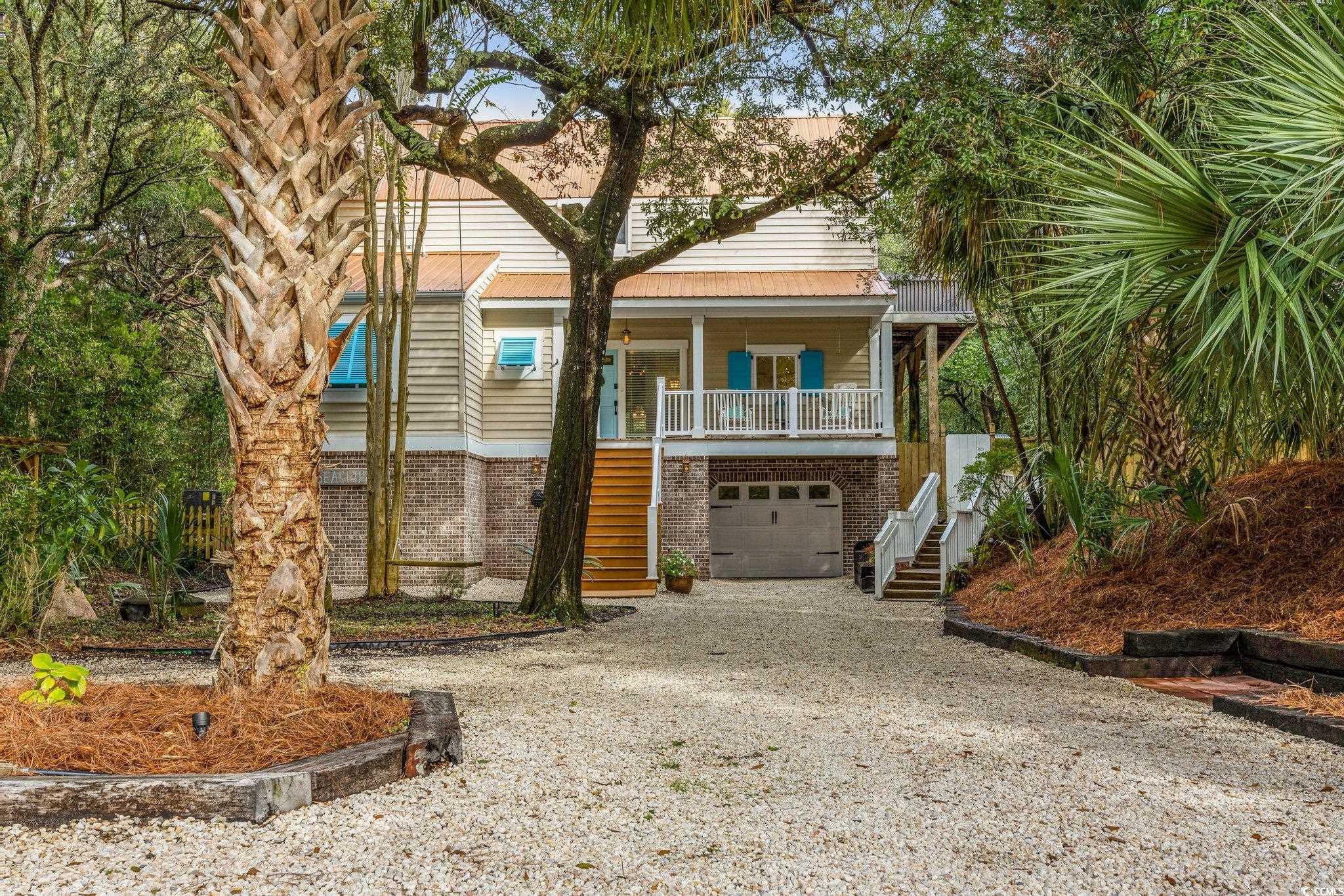 back on the market, due to no fault of the sellers!   private north litchfield beach oasis!  primary bath updated as of 4/1/24. listen to the waves from this spacious coastal home, just a short stroll to the beach.  this 6 bedroom, 5 full bathroom home sits on a half-acre lot that directly backs up to huntington beach state park.  there is plenty of privacy and space inside and out with an open floor concept ideal for entertaining.   with 3400 heated sq ft, this is the perfect beach home and yearlong retreat for families, entertaining guests, or a lucrative vacation rental investment.  location is key, and 245 windover dr delivers.  you will enjoy the best of coastal living without sacrificing the serenity of a quiet neighborhood.  current owners have made ample improvements to the property, come see this one of a kind of home for yourself!   pawleys island is located 30 minutes from myrtle beach attractions and a little over an hour to historic charleston.