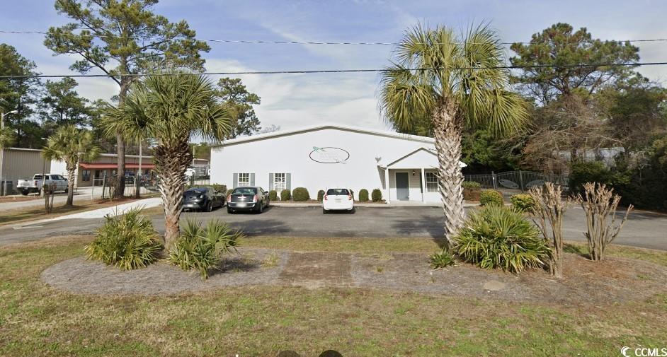 located just off tiller drive in pawleys island, this property is situated on 1 acre and totals roughly 14,236 sf. that can be leased as one unit or split into two as one 4000 sf office and warehouse unit and the remainder 10,000 sf as warehouse with a small office. you will notice on arrival the property has been very well maintained and is gated with a magnetic entry at the front door. as you enter there is a large open office floor plan in the front with two restrooms (shower in place on 2nd restroom as depicted on plans). there is a conference room/executive office located on the second story overlooking the original warehouse portion of the building. the original 4,236 sf was built in 1996 and10,000 sf was added on in 2007. the 10,000 sf can be sealed or partitioned off with fireproof roll up doors and has been used for light manufacturing and distribution. as you enter the 10,000 sf there are a few offices overlooking the warehouse with a breakroom and restroom. overhead there are skylights throughout providing quite a bit of lighting during daytime hours. the eve heights are 17’5” at center and 12’ at the side walls. there is 460v three phase power in place. at the rear of the property there are two 12’x12’ roll up doors. this property is zoned in the very flexible (rs) resort service district. please see the attached list of approved uses.