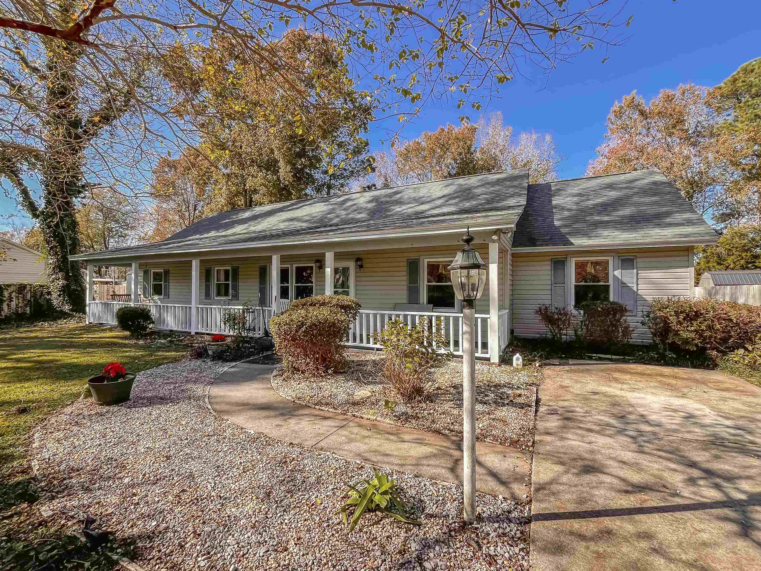 this beautiful non-cookie cutter 4 bedroom, 2 bath recently renovated home is located in the caropines community in surfside beach, and is just a little over a mile drive to the beach. the semi-open floorplan allows for you to see into both the kitchen and dining room clearly from the living room, and the den offers an extra common area that could be used as an office, game room, or play room for kids. the living room is cozy with built-in shelving and a wood burning fireplace. in the hallway off the living room to the left you will find the master bedroom suite, two smaller bedrooms, and a second full bath. the very generous sized 4th bedroom is accessed from the kitchen, and could easily be converted into a second master. the kitchen is spacious with l-shaped granite countertops and fingerprintless 3 year old stainless steel appliances. new flooring spans throughout the home. this home is sure to go fast, so make sure to schedule your showing today!