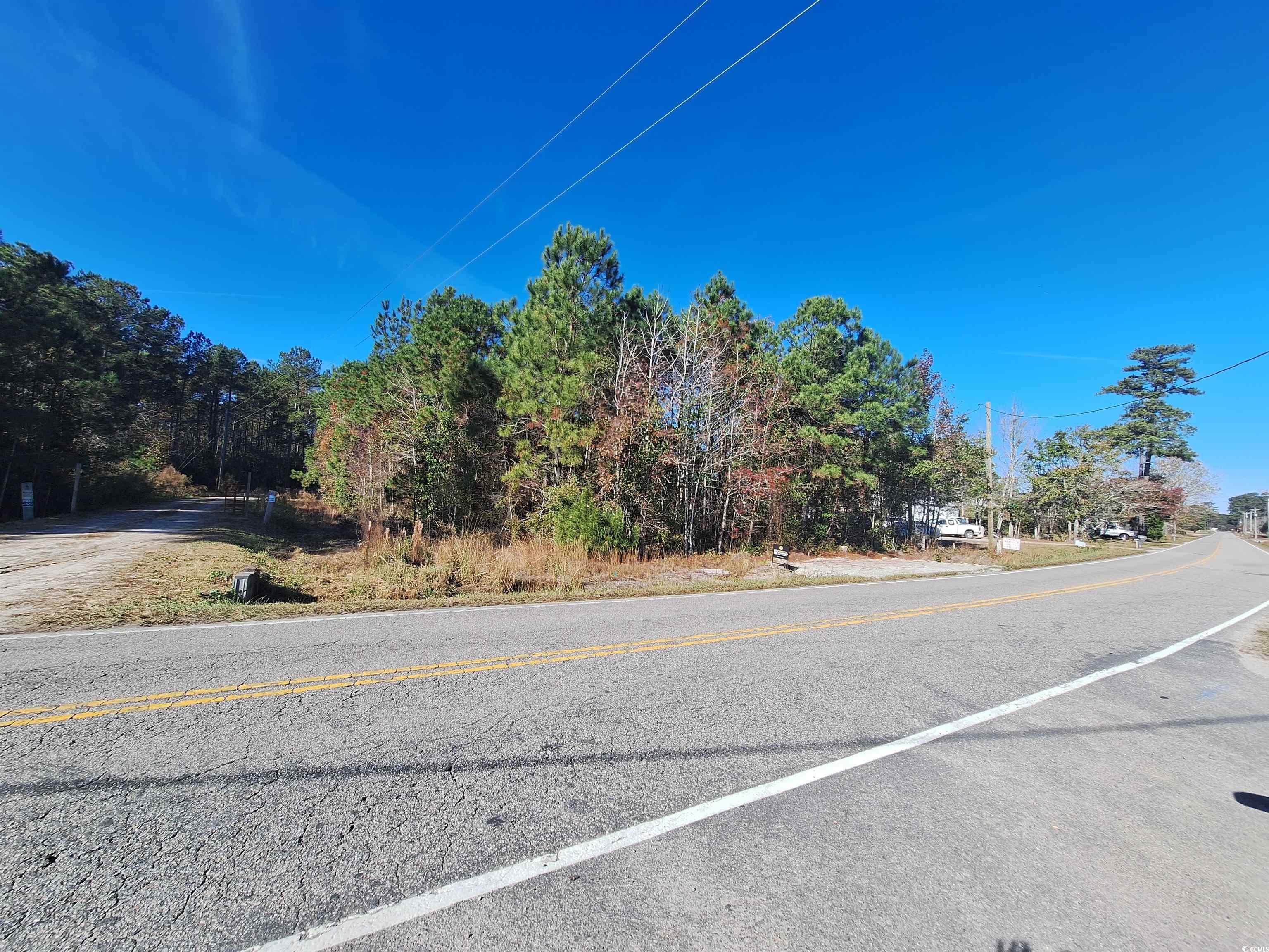 100' road frontage by 150' deep wooded lot new driveway just built mobile homes/ manufactured allowed zoned cfa city water/sewer seller will consider to have lot cleared-grinded down and keep buffered