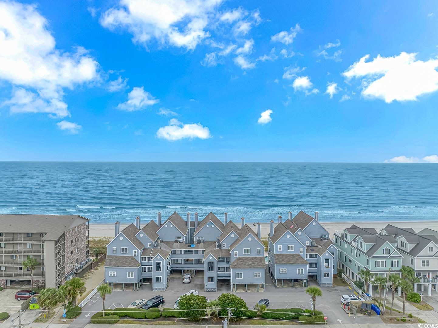 open house sunday, january 14th from 12:30-2:30! beautiful remodeled oceanfront condo located in cape coddages i in the town of surfside beach! this unit boasts many new upgrades and only has been used as a second home. on the first floor level you have an open concept layout with the kitchen and living room. the kitchen has been updated with quartz countertops, subway tile backsplash and stainless steel appliances. cozy up to the wood burning fireplace in the living room, while taking in the beautiful views of the ocean. there is also a half bath located on the first floor. the spacious master suite is located on the second floor, giving you great views of the beach. the second bedroom is also located on the second floor, with its own private bath. this complex building has recently undergone several renovations, including new patios, gutters, outdoor hallway carpeting, hardie board sliding and refurbished pilings and pool. grab your flip flops and beach chair and enjoy what coastal life is all about! buyer is responsible for verification of square footage, hoa & zoning.