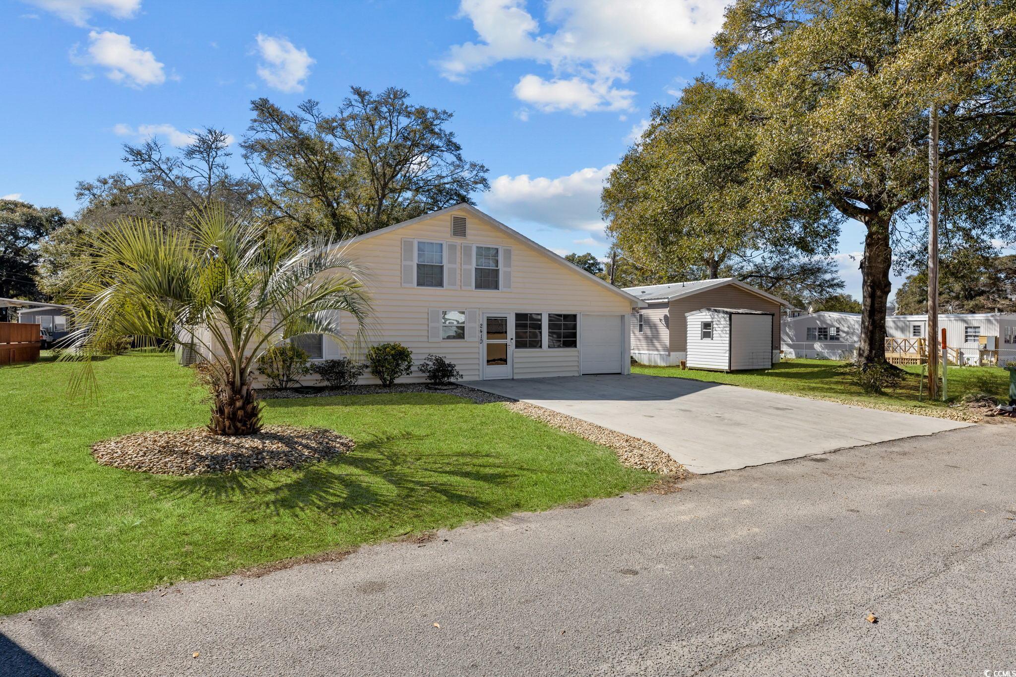 discover the homely charm of 2410 douglas st., a welcoming 4-bedroom, 3-bathroom residence in a friendly mobile home neighborhood in north myrtle beach, sc. this home, situated just a mile from the beach, combines the ease of coastal living with the warmth of a residential community.  step inside to find a spacious living room, perfect for family gatherings or a cozy evening in. the heart of this home is its large kitchen, offering ample space for cooking and dining, making it ideal for both everyday living and entertaining guests.  the master bedroom is a true retreat, featuring a lovely ensuite bath that provides privacy and comfort. each additional bedroom is well-sized, ensuring that everyone has their own comfortable space.  outside, the private backyard with a privacy fence offers a peaceful outdoor area for relaxation or social gatherings. with handicap accessibility, this home is thoughtfully designed to cater to a variety of needs.  located in a non-flood zone area, this property is a practical choice for those seeking a primary residence or a potential short-term rental. it's a straightforward, inviting home that provides plenty of room, comfort, and the added perk of being close to the beach.  at 2410 douglas st., you'll find a home that perfectly balances the simplicity of beachside living with the practicality of a spacious and comfortable interior.