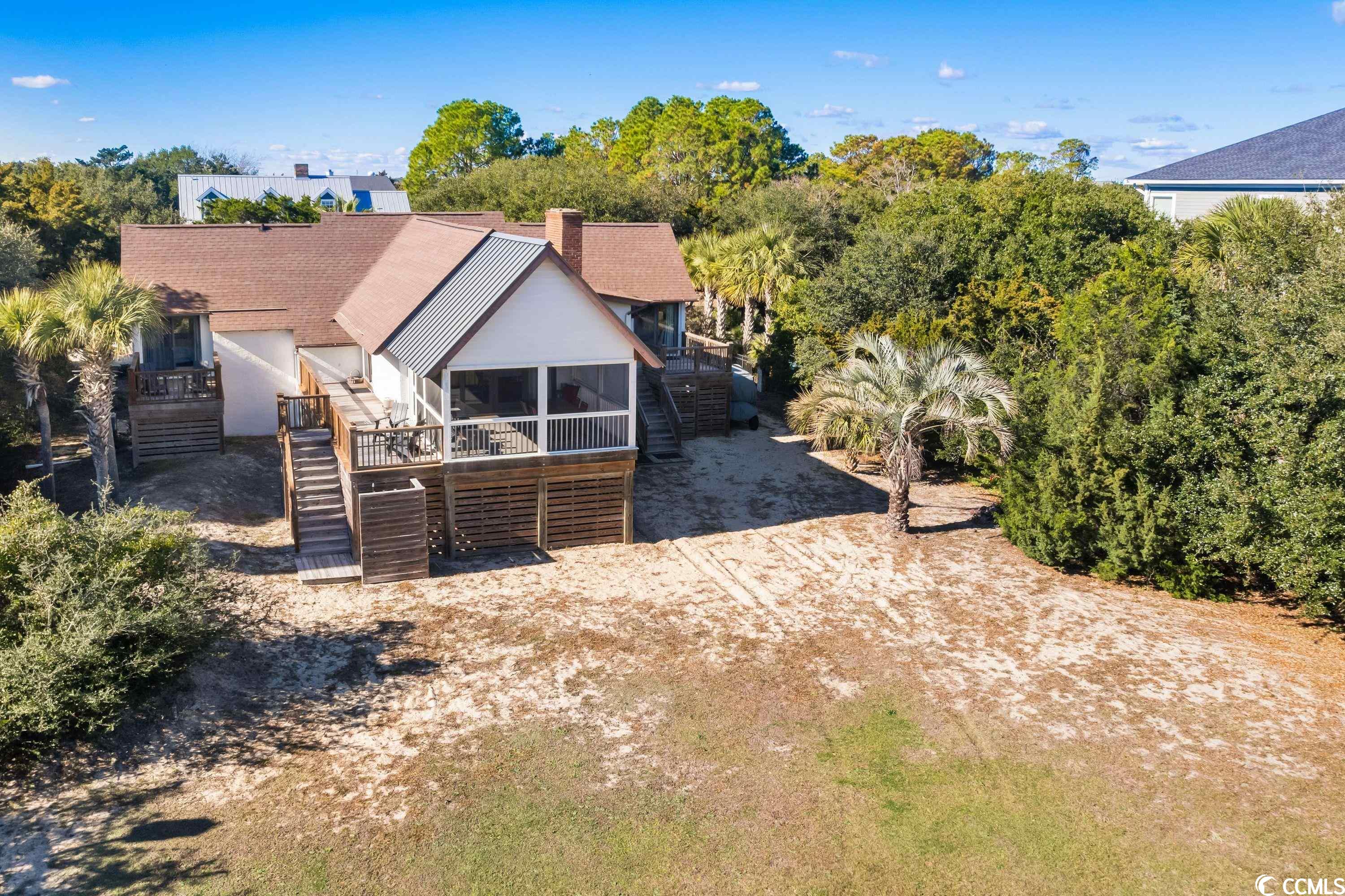 this classic debordieu beach house is located on pioneer loop in what we call (with a smile) the “historic district” of debordieu. the owners have done a masterful job making all aspects of the home comfortable and up to date. there is ample space for entertaining, a first rate kitchen, well-appointed bedrooms, a screened porch, and a beach access nearly adjacent. this home is perfect for the family desiring a great setting in a wonderful location.