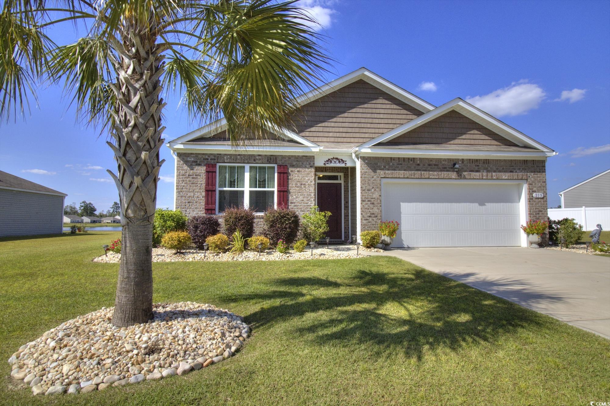 Come for the home, stay for the view.  Located in the Carolina Forest school district and nestled in the tranquil Reflections community, this brick-front beauty offers an unparalleled lakeside living experience, where nature's serenity meets modern comfort. With 4 bedrooms, 2 baths, and 1773 heated sq. ft., this home promises both space and warmth within its open floor plan.  The heart of this home is undoubtedly the spacious gourmet kitchen island, which seamlessly connects the dining area and living room—creating an inviting space for gatherings. The kitchen is equipped with granite counters, a walk-in pantry, and stainless steel appliances, all set against the backdrop of low-maintenance luxury vinyl wood plank floors that extend through the main living areas.  The property's previous owner has meticulously maintained every inch, ensuring regular HVAC upkeep, pristine landscaping, and thorough indoor cleaning, making it move-in ready for its next fortunate owner. The Primary Bedroom, a peaceful retreat located at the home's rear, features a large walk-in closet and an en-suite bath with a 5 ft. walk-in shower, double vanity, and sinks. Sliding doors from the dining area open to a covered porch, offering a secluded spot to revel in the morning calm with views of the pond.  What sets this home apart is not just its interior charm but its extraordinary setting. Overlooking a beautiful and well-maintained lake, the area is a haven for egrets, hawks, and bald eagles, with catch-and-release fishing allowed for residents. The community itself is exceptionally quiet, providing a peaceful escape from the hustle and bustle. Homes here enjoy ample space between them, ensuring privacy and a generous side-yard. Neighbors are more than just friendly; they're helpful, fostering a wonderful sense of community through regular events and gatherings.  Located just minutes from Historic Downtown Conway and River Walk, Reflections is a gem off Hwy 90 and Lees Landing Circle. This Natural Gas community is distinguished by lots averaging 1/3 acre surrounding a sprawling 17 1/2 acre lake. Amenities include a pool, fitness room, outdoor pavilion, and fire pit—all complemented by breathtaking views of the pond. This home is more than a dwelling; it's a lifestyle waiting to be embraced.