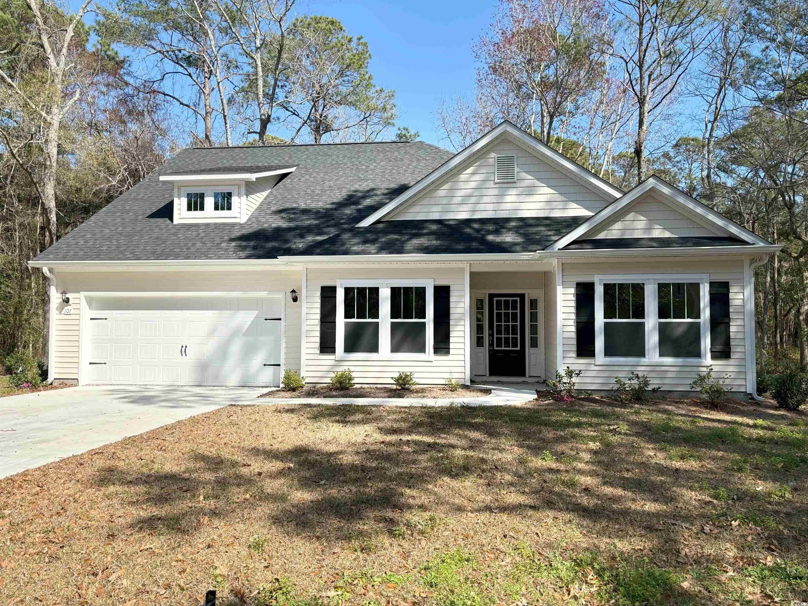 immerse yourself in the serene natural surroundings of this newly built home, ready for you to move in! with trees enveloping three sides, you'll enjoy privacy and a peaceful atmosphere. this open concept, 4-bedroom, 3-bathroom home features a 2-car garage and offers ample relaxation and comfort. conveniently located near pawleys island historic district. explore the marsh or 1st street beach access with your golf cart, marsh/beach lovers will be delighted. golf enthusiasts will appreciate the quick 2-minute drive to pawleys plantation golf and country club, true blue golf club, and other golfing options. easily access publix shopping center, brookgreen gardens, huntington beach state park, and more!  step inside to discover luxury vinyl plank flooring, granite countertops, and elegant touches throughout. the master bedroom boasts spaciousness and double stepped tray ceilings, while the master bath offers easy-to-clean tile walls with a fiberglass base shower, ada hi-boy toilet, and separated double vanities. the living room showcases unique double stepped tray ceilings with recessed lighting for added elegance. with ample storage space, you'll have room for all your belongings. the second floor features a large private suite for guests or a home office. relax in the private backyard on the spacious screened-in covered porch with a cup of coffee or tea or just for entertaining guests! don't miss out on this exceptional property! measurements are approximate and buyer verification is required.