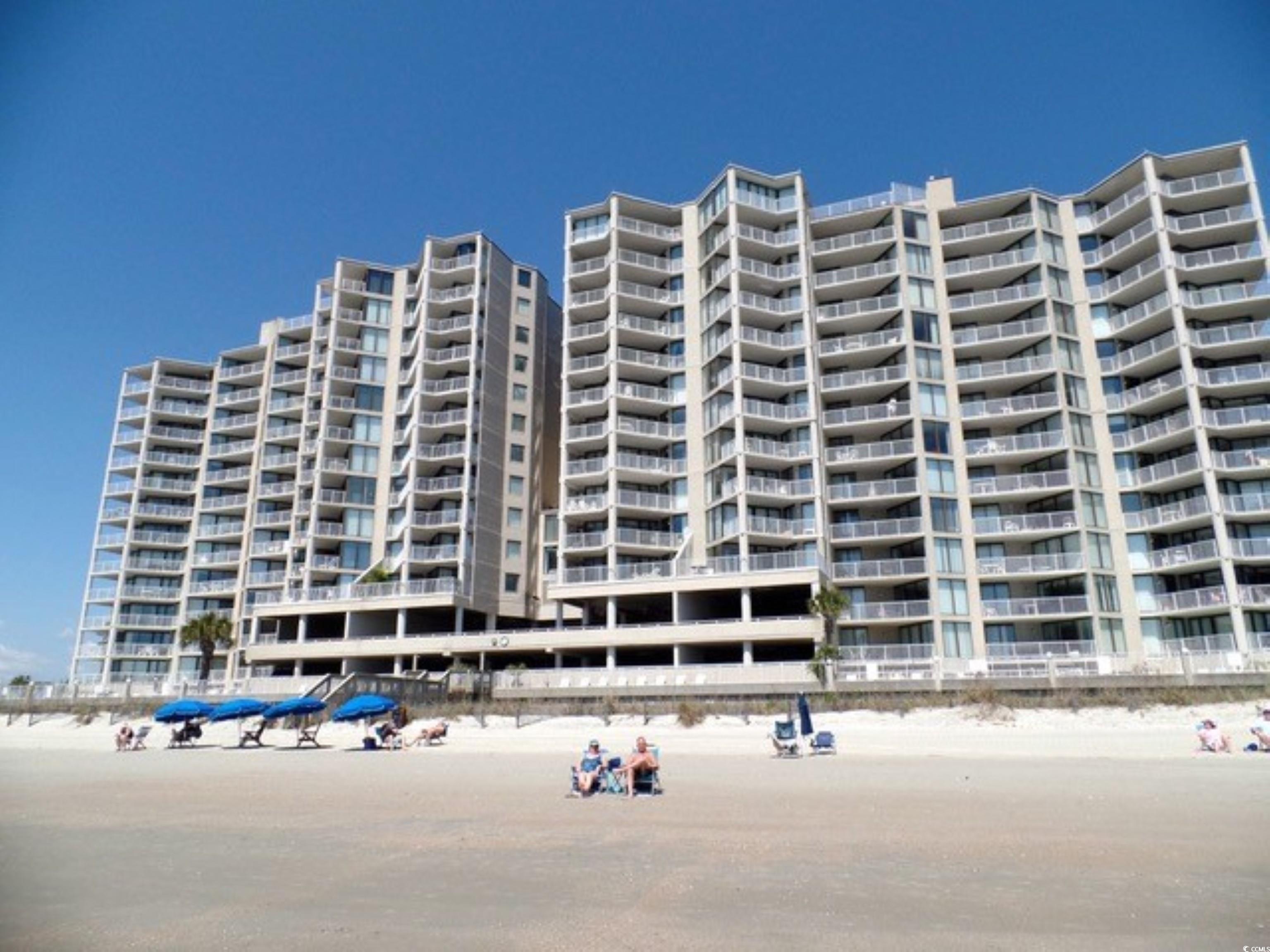 completely renovated two-bedroom, two-bath oceanfront condo in the very desirable one ocean place in the garden city area.  this unit is in the north tower on the 5th floor.  it is like new inside with new contiguous luxury vinyl wood look flooring in the living room, dining room, and foyer.  the kitchen has been redesigned with new white shaker cabinets taking advantage of every inch of space.  there is a teal tile backsplash and the countertops are granite, and the appliances are stainless steel.  both bathrooms have also been redesigned.  the master bath has a free-standing white vanity with a pedestal sink and a large tiled shower with a custom glass door.  the living room, dining room, and kitchen area are approximately 15' x 29' and have spectacular ocean views through an angled glass wall of ceiling-to-floor windows.  the balcony is large and recessed for privacy.  the master is also oceanfront with a king bed.  the second bedroom has 2 twin beds (or 1 king) and private access to the hall bath.  the building has a gym for owners, a lounge, two pools, and two heated hot tubs.  pool decks are elevated and provide fantastic ocean views for lounge chairs.  great for a primary residence, second home or rental.  a must see and move-in ready.