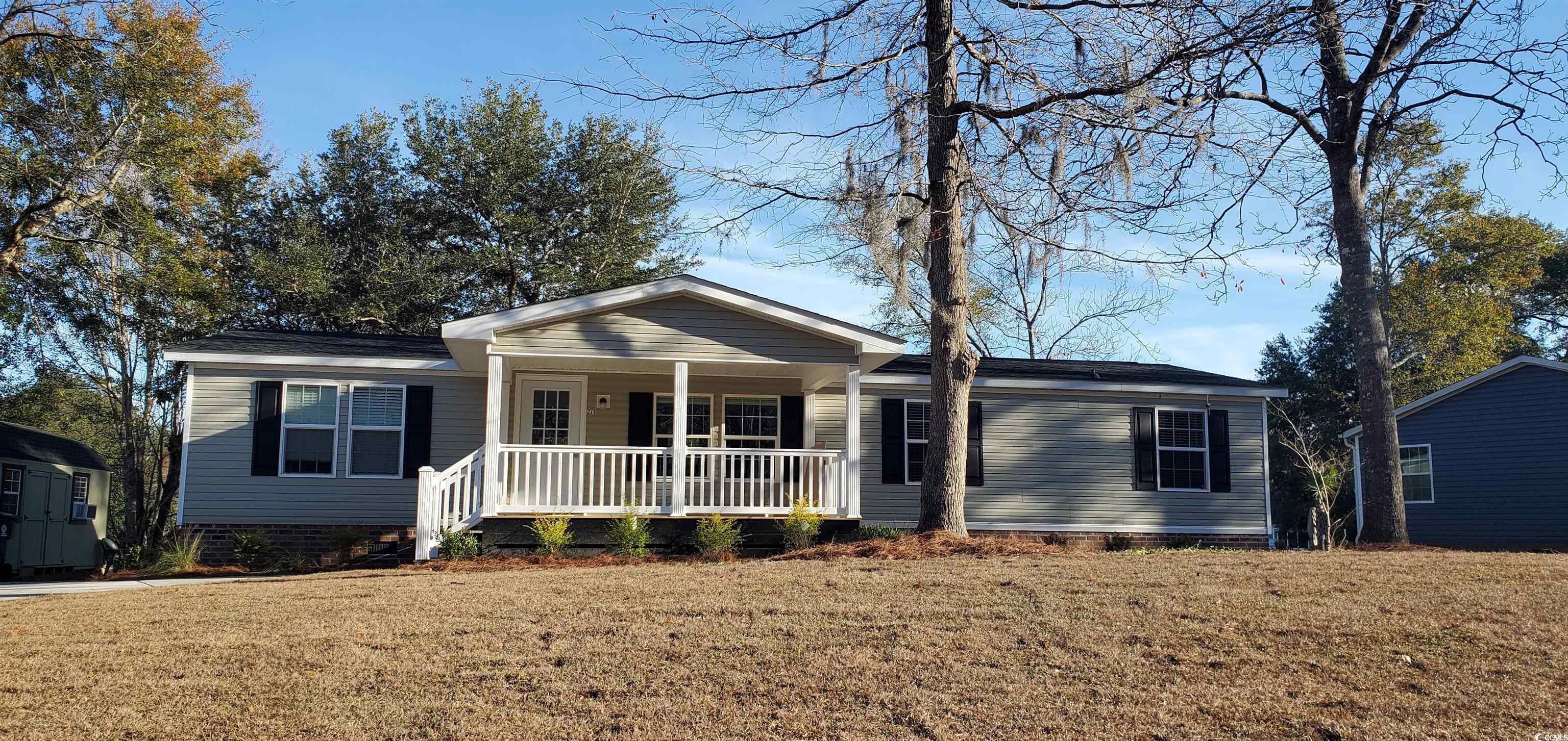 this completely renovated 4 br/2 ba home sits on a large lake with a fantastic view. stainless appliances with granite counters and backsplash, large work island, new lvp flooring, new roof, new hwh and freshly painted throughout. 19x11 front porch and 20x11 back porch. detached 20x11 storage building also on lot. new owners must be approved by the park. this home sits on a leased lot where you only pay the lot rent and no taxes on the land. no rentals allowed in hawks nest, must be a second home or permanent home. limit 2 pets. you are only 2.5 miles to the famous murrells inlet marshwalk (the seafood capital of sc).less than 5 miles to the beach and ocean. intracoastal waterway with boat launch close by. other activities include fishing, golfing, shopping, brookgreengardens and the hospital is close by.