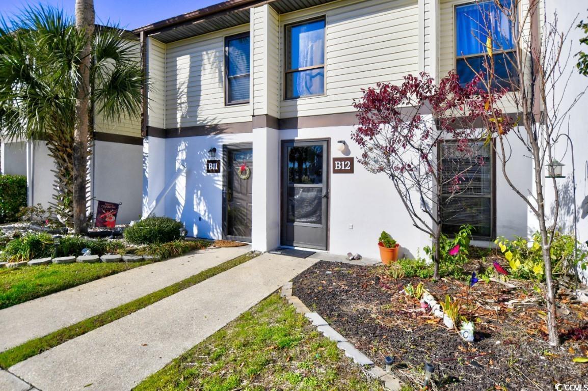 discover this charming townhouse in north myrtle beach, a cozy retreat with beautiful vinyl and tile flooring that adds a touch of modernity to the space. complete with a washer, dryer, and fridge, ensuring a hassle-free move-in experience. whether you're envisioning an investment opportunity, a serene beach house escape, or a permanent residence by the coast, this property promises a comfortable and convenient lifestyle within a vibrant community.