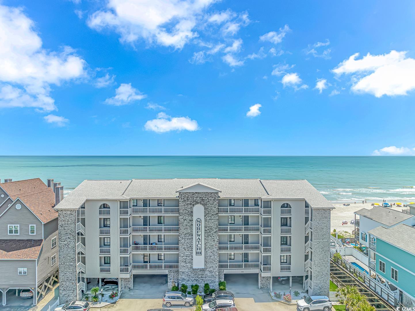 rare find! updated oceanfront condo located in surfside beach! this condo has two bedrooms, two bathrooms, new luxury vinyl flooring, custom cabinets, granite countertops and tile showers/tub combo. surfwatch lll condo complex has an elevator, plenty of parking and a community pool. enjoy endless ocean views from your balcony. this unit is located on the third floor and is an end unit. grab your flip flops and beach chair and enjoy what coastal life is all about! buyer is responsible for verification of square footage, hoa & zoning.