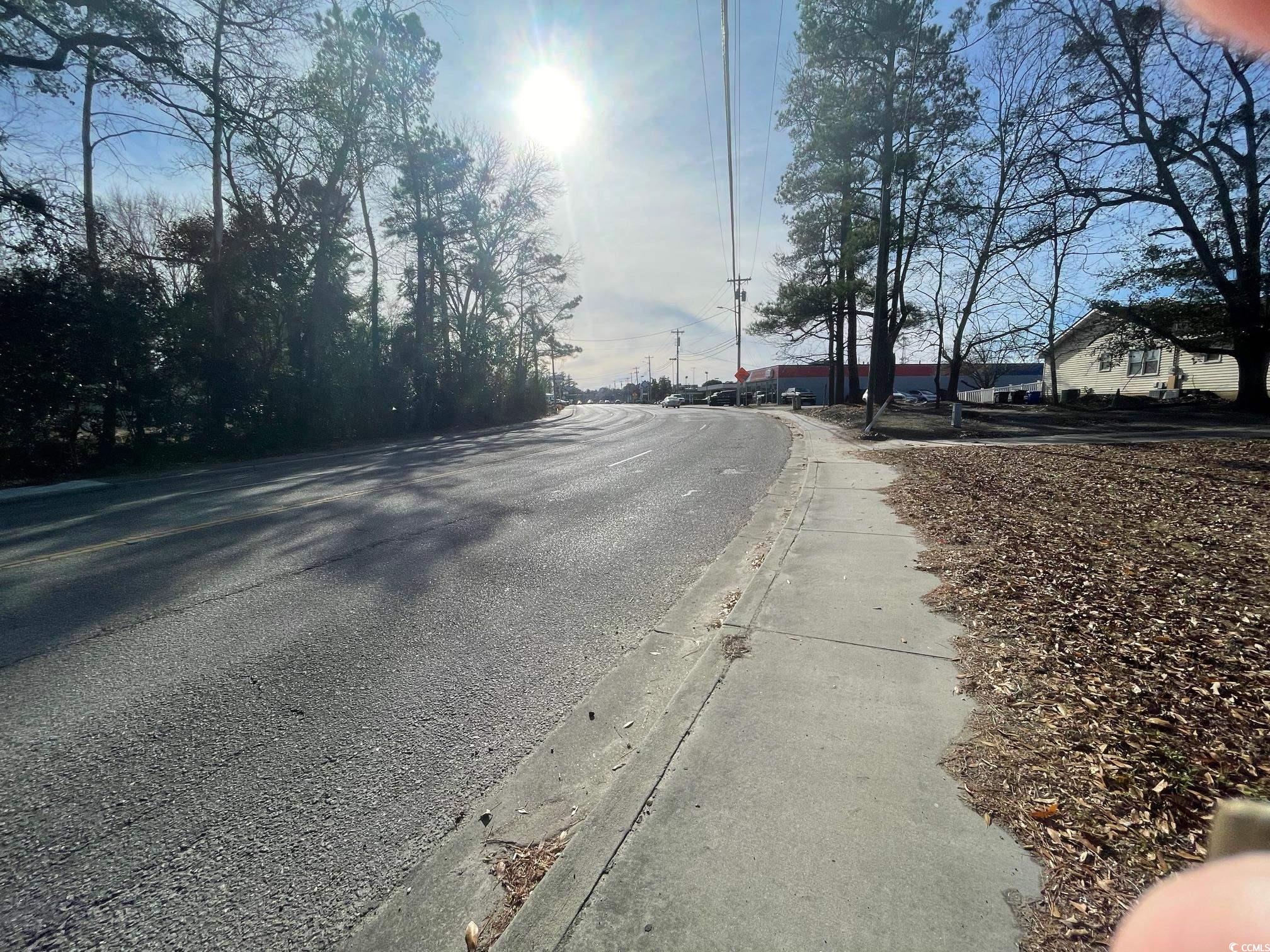 lot available on 16th ave between hwy 501 and elm street.. lot is approximately .74 acre. currently zoned residential but horry county zoning dept states may be rezoned to neighborhood commercial, located right beside the coastal shopping center.