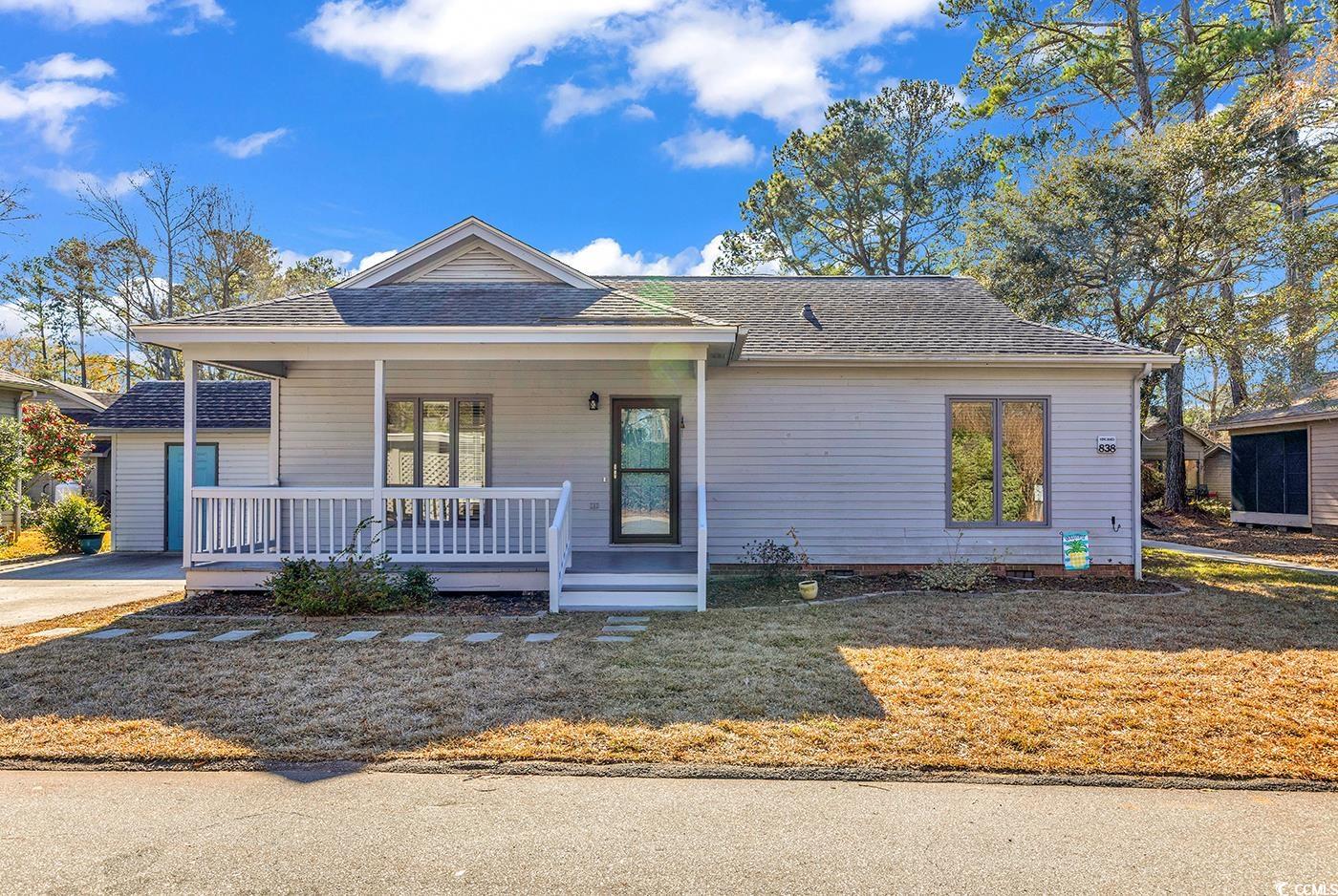 welcome home to this turn key patio home in the highly sought after jamestown colony in garden city. located in a quiet cul-de-sac loop, as you pull in the driveway you will love the warm, welcoming atmosphere in this quaint neighborhood and the large front porch that welcomes you. entering the living room, the easy flow to the dining area and kitchen is accentuated by a beautiful color scheme and lvp flooring. the back deck off the dining area will provide hours of entertainment and relaxation. the  primary suite is outfitted with a spacious full bathroom. the secondary bedroom is adorable, featuring a fun board and batten accent wall. you'll love the custom tiled shower in the second bathroom and the updated vanities of both bathrooms. the sellers have made home ownership a breeze with plenty of floored attic space, a large detached storage shed, french drain and graded lawn. enjoy being in walking distance to the pool and the pathway that takes you through the neighborhood. you can take your golf cart to area restaurants and to all the fun garden city has to offer. part of the coveted st. james school district and just minutes to the nightlife of the murrells inlet marshwalk, don't miss this opportunity! take the virtual 3d matterport tour and schedule your showing today!