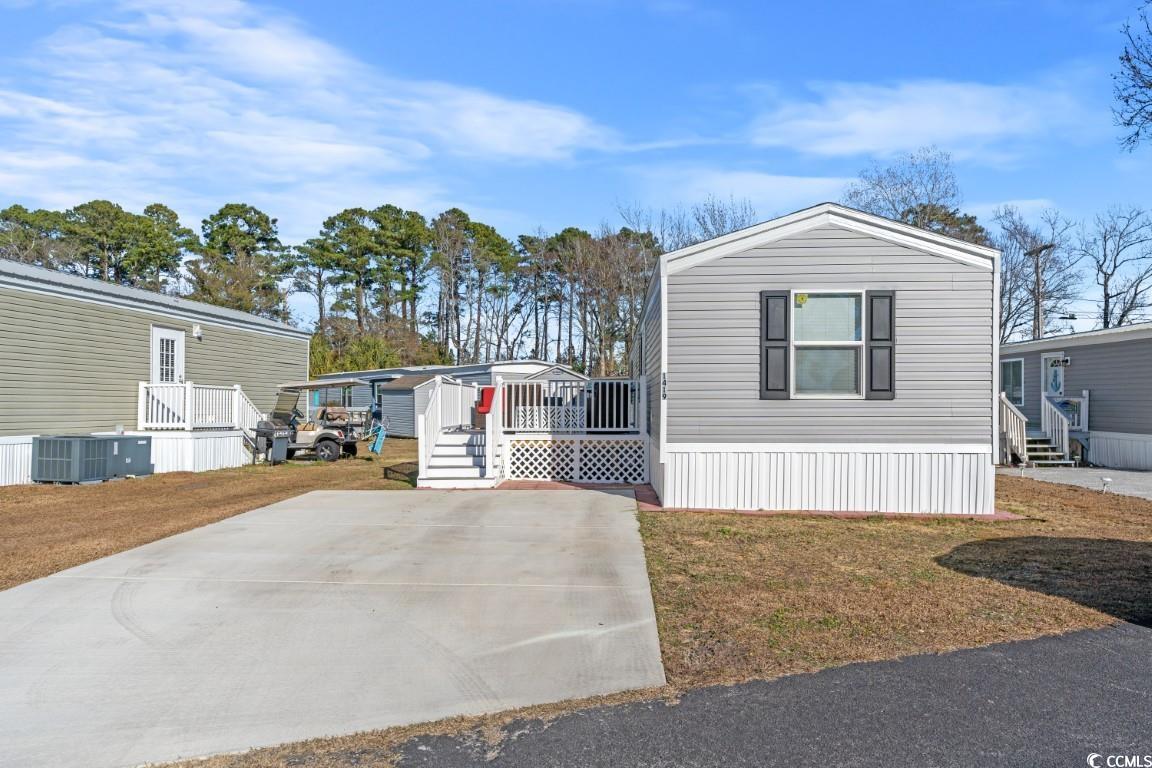 motivated seller - bring offers- 2022 clayton home priced below appraised value in north myrtle beach between the intercoastal waterway and 1.2 miles from the ocean. traditional open floor plan concept 2 bed/2 bath • under manufacturer’s warranty through 7/2024 • 12x12 trex deck – no upkeep/painting required • shed • concrete drive,12 inch pavers surrounding home preventing damage to underpinning,laundry room ,white l-shape kitchen with dishwasher, electric stove, microwave, refrigerator and oversized kitchen pantry will convey • master 145.6 sq ft • bedroom 107.9 sq ft • dimensions: 14x60 with 820 liveable sq ft lot lease  includes: • water • trash • lawncare • pool coming in 2024!! bring offers