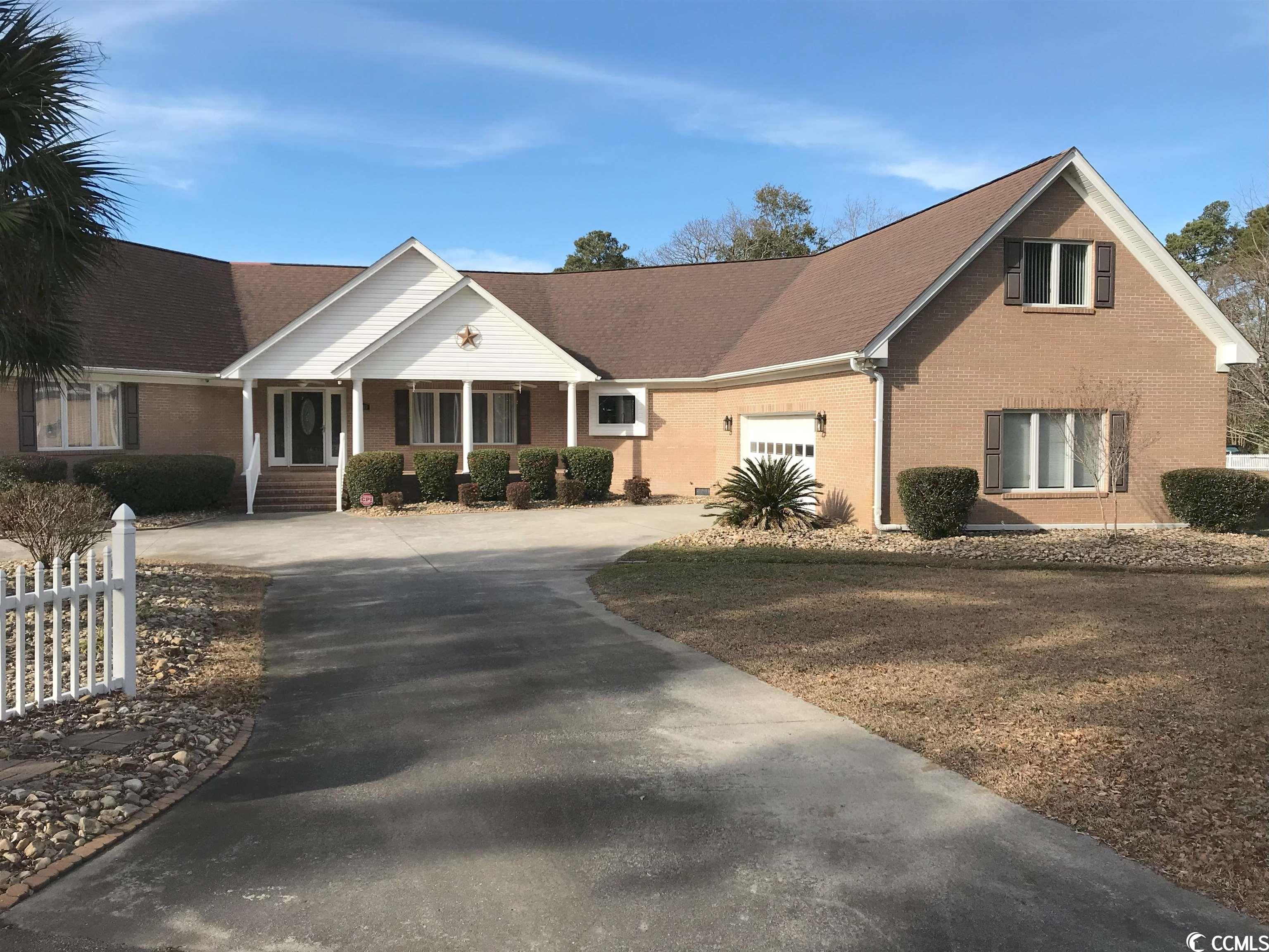 coastal living at its finest! extremely well built all brick home on a large, street to street lot! .79 of an acre!  these homes just do not come available often! the sought after neighborhood of palmetto shores offers close proximity to the beach (golf cart/ walk) while providing a quiet, relaxing atmosphere with the added bonus of no hoa!! pride of ownership stands out in this well kept, stunningly appointed home. the open floorplan provides 2 living spaces, with loads of storage throughout. lvp and tile flooring throughout the main living areas. master suite has double vanity, jetted tub and a large walk-in shower. smooth surface kitchen counter tops and vaulted ceilings in the dining and family room. the home offers a dedicated office and a "hidden" closet within the primary bedrooms walk-in closet!! large, air conditioned bonus room above the garage could be another bedroom/ game room/ art studio. home comes with a gas tankless water heater and gas fireplace! the oversized 30' x 22' garage is perfect for all your beach gear and golf cart, while still providing room for your car. schedule your showing today.
