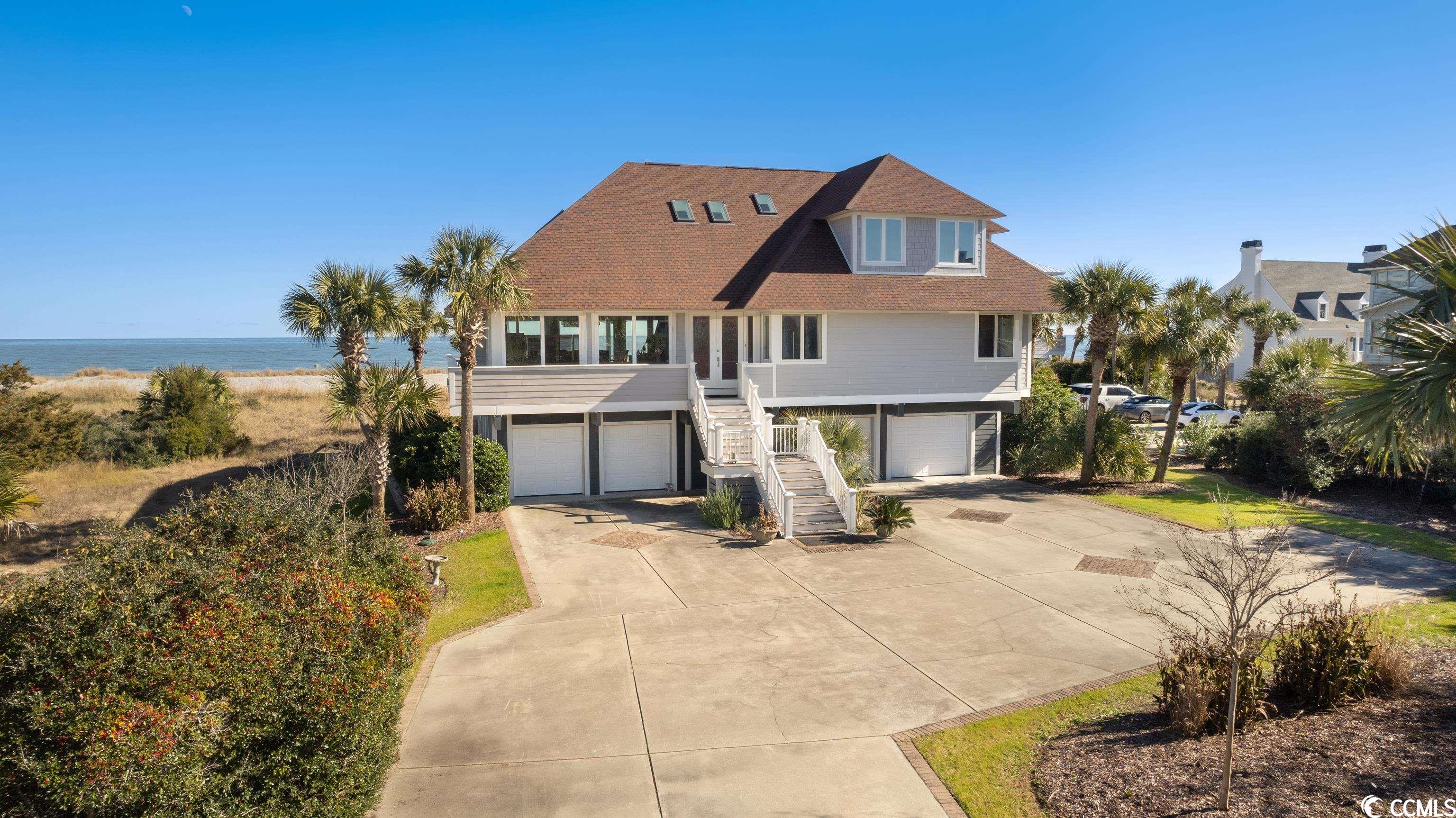welcome to easy oceanfront living in the heart of debordieu colony. 1367 debordieu blvd. exudes coastal charm with 5 bedrooms, 4 bathrooms and expansive oceanfront views. enjoy the large back  deck with composite decking, the meticulously maintained interior, and the enduring quality of new cement fiber siding. the first floor features an open kitchen/den/dining area  as well as the primary bedroom with its own private deck to take in the sunrise each morning. there are three bedrooms on the second level and a flex space ideal for a second den, an office or workout space where your guests are sure to appreciate a comfortable respite when not enjoying the beach or the many amenities debordieu has to offer. this home seamlessly marries function, comfort, and practicality all while offering the very best of beach front living. debordieu's beach club, golf club, and tennis / recreational amenities are are quick golf cart ride away.