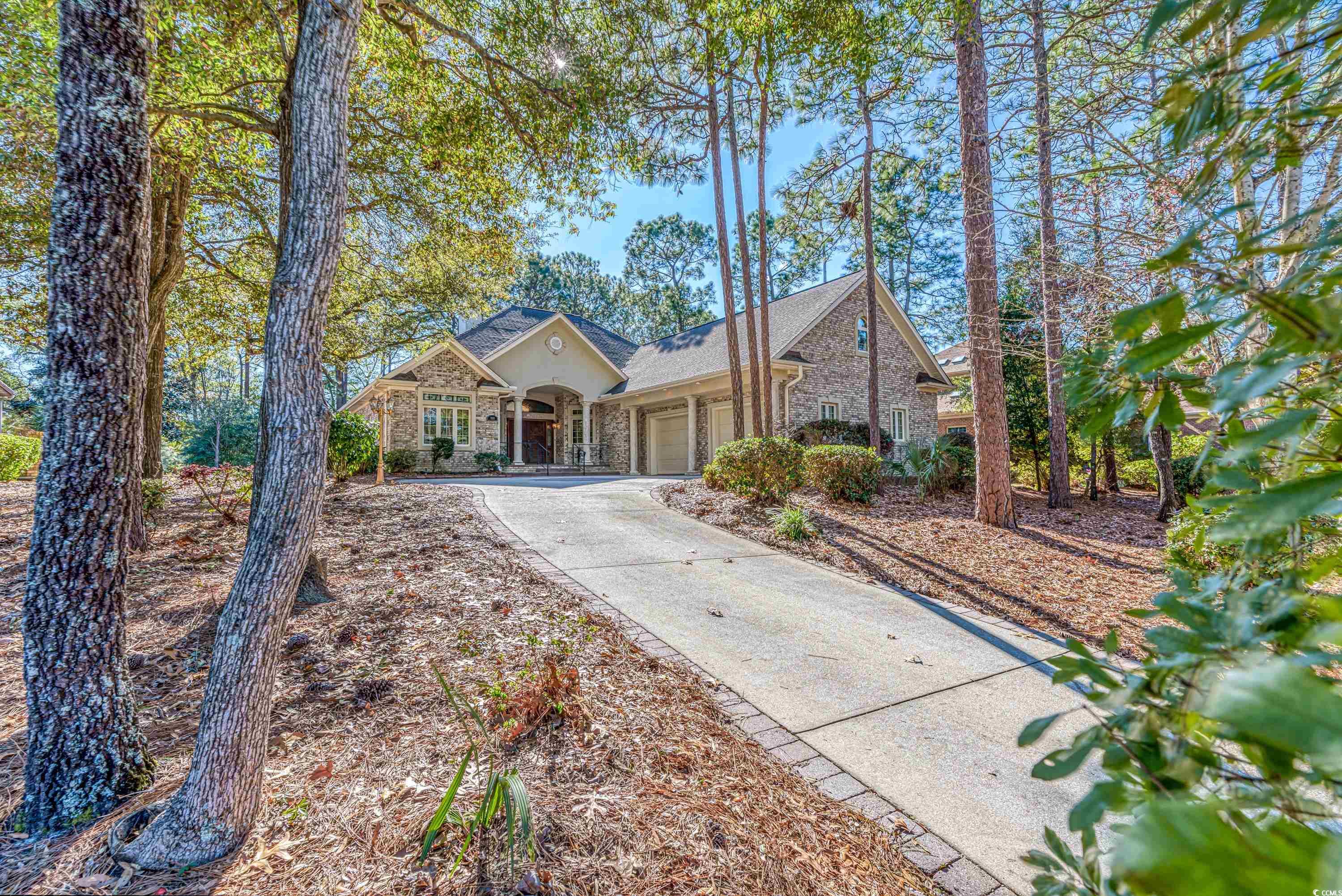 discover the epitome of luxury living at 1153 heritage drive, nestled in the prestigious heritage plantation of pawleys island, sc. this all-brick, 3-bedroom, 3 bath home spans a generous 3,145 sq ft of heated living space, set on a .46 acre lot. it's ideally located within walking distance to the clubhouse and marina, offering a private setting with breathtaking golf course views. the home's standout features include techshield radiant barrier roofing and a whole-house rs 20000 onan power generator with an automatic transfer switch. the living room, complete with a gas fireplace, 11-foot ceilings, ceiling fans, and french doors opening to the pool/patio area with wet bar and new ice maker. the residence also boasts a formal dining room, a large den/study with hardwood floors, and a laundry room with a washer/dryer. the first-floor master suite includes a sitting area, tray ceiling, recessed lighting, large walk-in closets with built-ins, double sinks, a whirlpool tub, shower, and direct access to the patio/pool. highlighting the home's elegance are the massive mahogany double door entry, custom stained glass windows, a kitchen equipped with ge monogram appliances, a 14-foot long granite work island, and a room-sized pantry with built-in cabinetry. additional luxury features include a triple trey ceiling in the dining room, an extra-large laundry with dual-use cabinets, and a spacious master bath with dual vanities and a separate water closet. the home's 8,000-gallon kidney-shaped heated pool and patio area serve as the perfect spot for entertaining, overlooking the golf course. the upper level houses a multi-purpose bonus room with hardwood flooring, and there's ample storage with a walk-in floored attic and an oversized double-door, two-car garage with a separate storage room. this residence, with its exquisite details and prime location, presents a rare opportunity to own a piece of paradise in south carolina's coastal region.