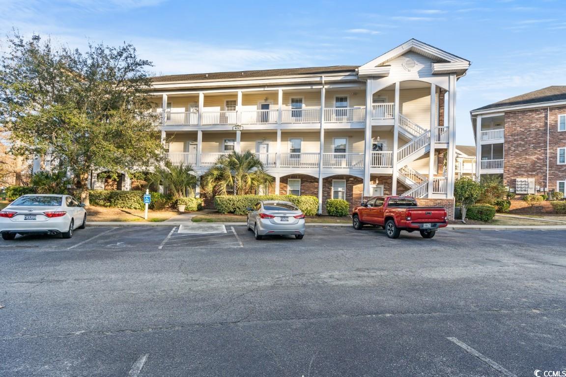 presenting a meticulously upgraded end 2-bedroom, 2-bathroom in the esteemed community of riverwalk at arrowhead. this residence with over 1,120 sqft has never before been rented, showcases a wealth of modern enhancements, including a brand-new 3-pane glass window slider framing picturesque golf course and stream views of the 4th hole tee box of the cypress course. from the carefully curated fixtures to the updated flooring, every detail has been thoughtfully considered. the spacious bright open floor plan seamlessly integrates the kitchen, dining, and living areas, boasting a new chef's stove, ample cabinet space, and a breakfast bar. retreat to your private balcony, accessible from the master bedroom, and unwind with a stunning golf course panorama. with added conveniences like included washer & dryer, this condo offers refined living in proximity to indoor/outdoor pools, mature walking paths, and the scenic waterway. perfectly situated near the grand strand's premier amenities, this is an unmissable opportunity for a full-time residence, vacation home, or rental property. schedule your showing today to experience the epitome of comfort and style. this unit is turn key, move-in ready houseware, furnishings, decor, appliances all stay.