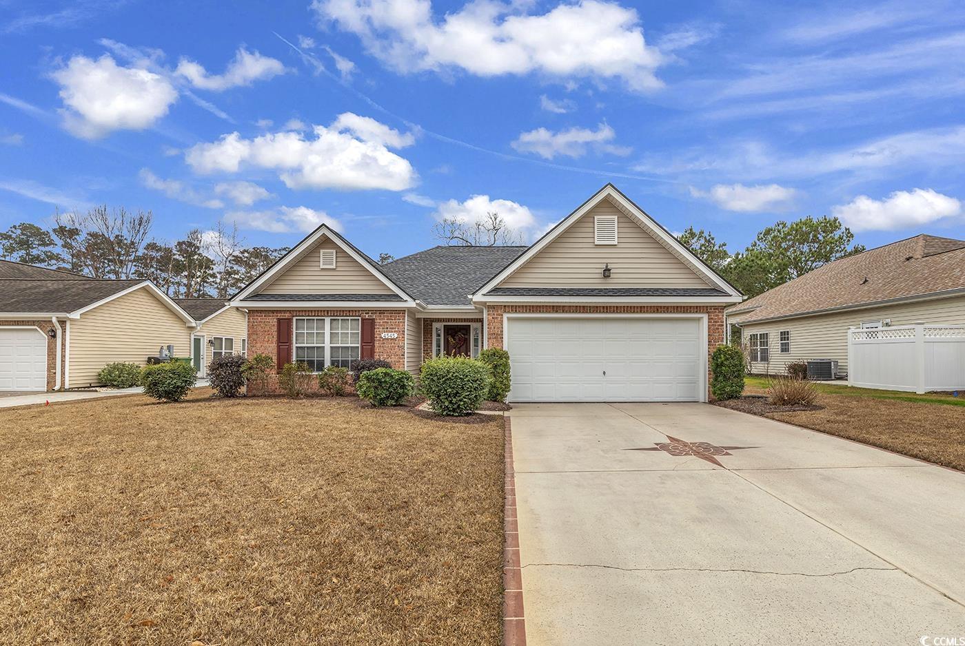 4545 fringetree drive is a charming, single-family home located in the gated community of wachesaw east in murrells inlet. the property offers a peaceful, welcoming environment, ideal for families and retirees. this home features a classic design with a two-car garage, a lovely backyard with lush greenery, mature trees, and a pond view with the 2nd green of the wachesaw plantation east golf course on the opposite side. inside, the main living area boasts high ceilings, creating an inviting space for gatherings, complemented by a cozy carolina room. the kitchen is well-appointed with modern appliances, ample cabinet space, and a spacious pantry.the primary bedroom suite is a retreat with a walk-in closet and an en-suite bathroom. two additional bedrooms offer comfort and privacy. wachesaw east amenities include a pool, tennis and pickleball courts, a basketball court, and a fitness center, along with access to the wachesaw plantation east golf course and walking trails. conveniently located, 4545 fringetree drive is minutes away from the grand strand beaches, renowned golf courses, shopping centers, restaurants, the marsh walk, and entertainment options. a fantastic opportunity to own a meticulously maintained home in one of the grand strand’s hottest areas.