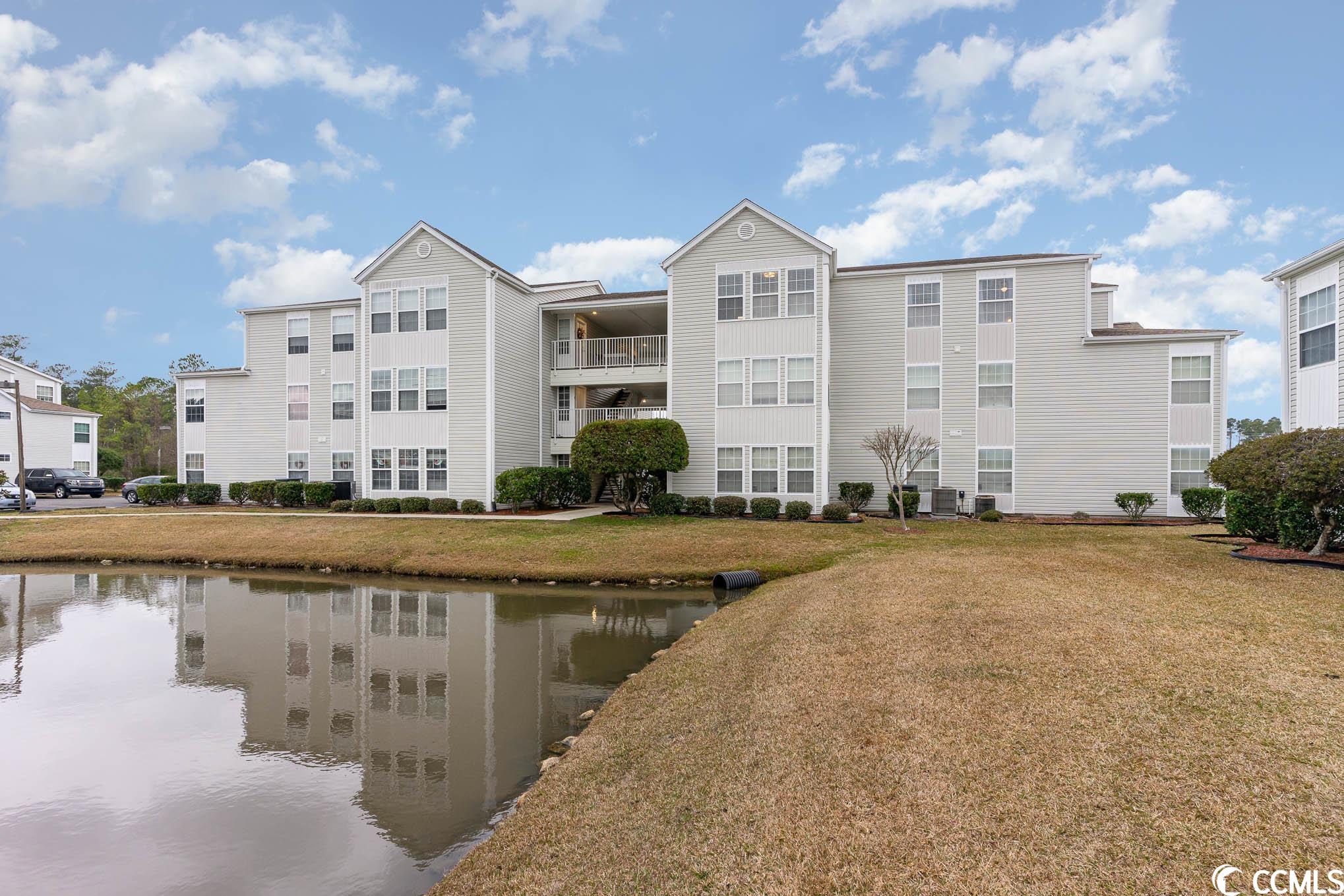 don't miss out on this beautiful surfside beach condo with a gorgeous, sun-filled carolina room that overlooks the pond. featuring cathedral ceilings, an electric fire place, beach decor, a new hvac unit and abundant closet space, this well-maintained 2-bedroom, 2-bathroom condo presents a great opportunity as a vacation home, rental investment or permanent residence.  it comes fully furnished and is ready for you to move right in.    southbridge is in an ideal location, close to the beach (about 1.5 miles), golf courses, myrtle beach state park and myrtle beach international airport.