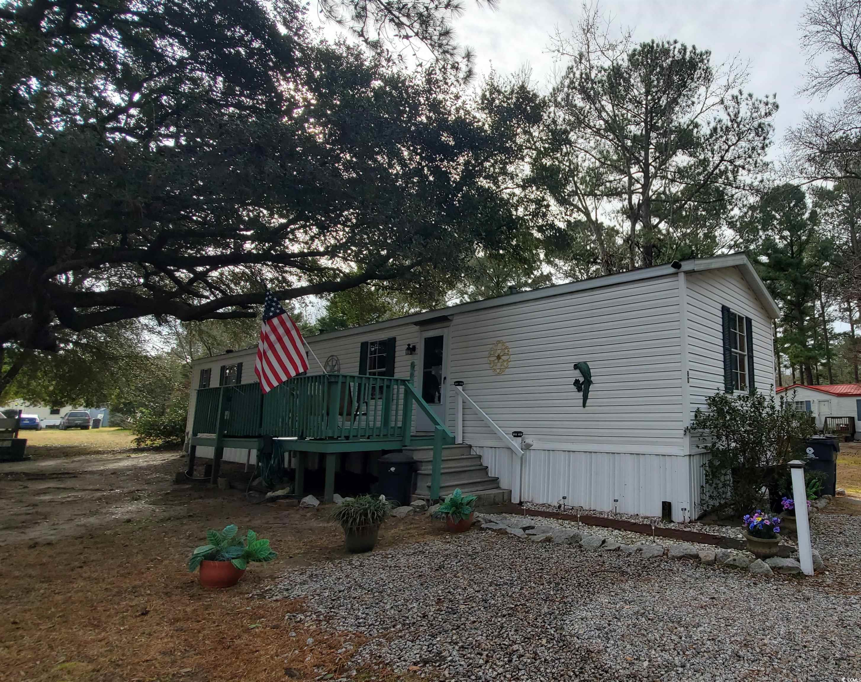 2 bedrooms, 2 baths manufactured home that has recently had a lot of improvements. new rheem heat pump 2020, all new front bathroom 2020. all new rear bathroom 2021.new rheem 40 gal water heater 2024. new sub-floor floating floor front bedroom 2024. rebuilt 8x20 deck in 2023 new paint. new rear stairs 2024 with new paint. 10x12 outside detached storage building. home is in very good condition, it has a large deck in front & an 10x12 outside storage bldg. it's in a small community with extra large lots. it's sitting on a big lot with lot's of old live oak trees, simply a beautiful private location. you'll have to see it to appreciate it's beauty. ginny hill mhp (a small family owned park), a 55 & up community located in murrells inlet, sc, approximately 15 minutes south of myrtle beach. near murrells inlet's famous marsh front restaurants and boardwalk, close to huntington beach (oceanfront) state park & beautiful brookgreen gardens. also near lots of golf courses & many other types of entertainment. only minutes from a modern hospital& doctors' o
