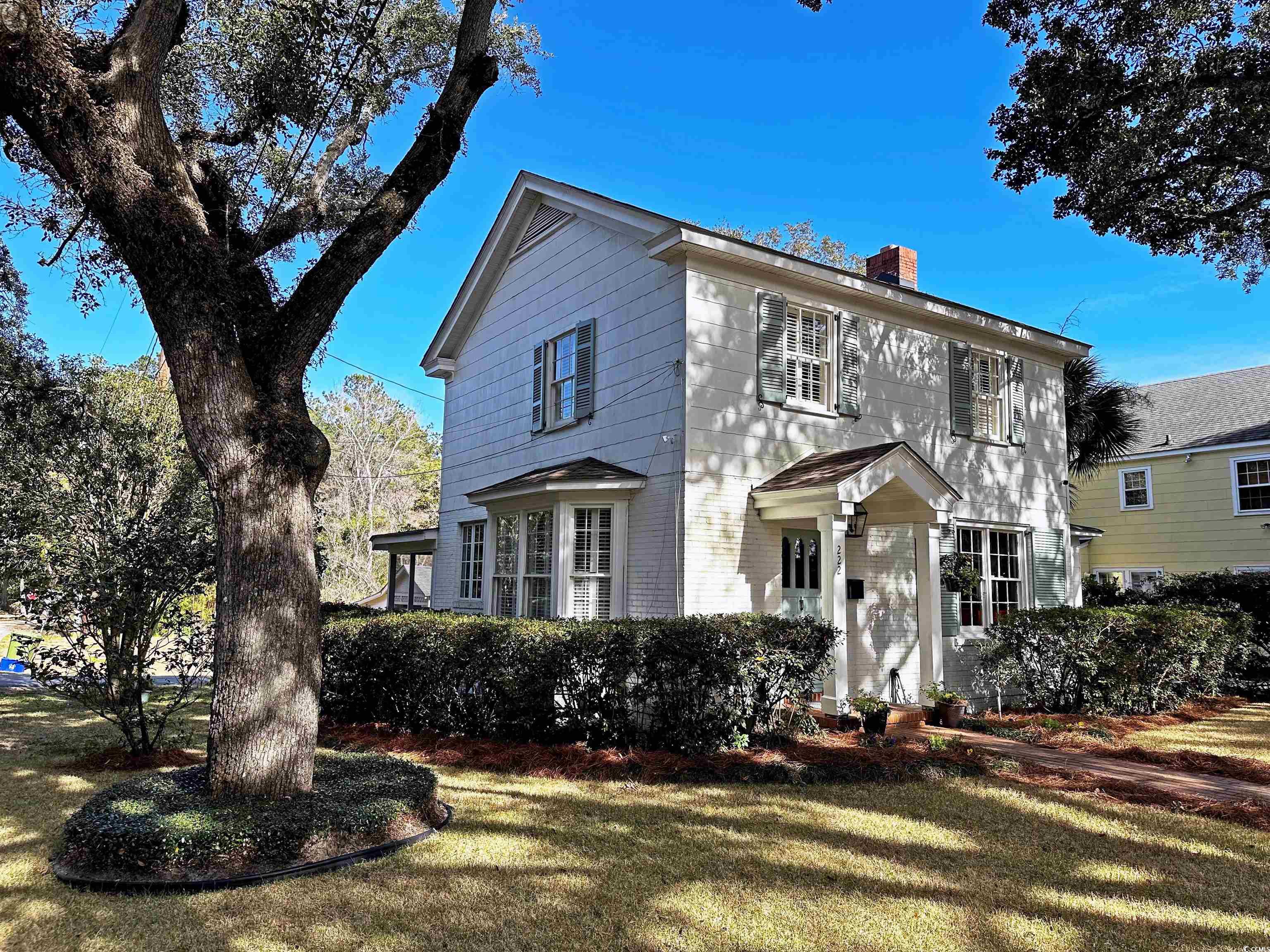 lovely renovated 1946 home offers all the conveniences of a new house while retaining much of its charm and character! the spacious corner lot with stately live oaks boasts a beautiful saltmarsh inlet view in historic georgetown. numerous deep-dive improvements include new plumbing, electrical wiring, roof and hvac (late 2020). kitchen now enjoys an open-concept floor plan with the formal dining room boasting quartz counters, stainless-steel appliances, shaker-style cabinets and new triple casement window providing abundant natural light. this two-story home has two bedrooms and newly renovated full bath on the top floor as well as a first-floor bedroom with full bath. the downstairs bedroom could alternatively make a great sun room sitting area. additional features include fireplace, downdraft gas cook stove, cedar-lined closets, detached garage and ev charging station. exterior plantation shutters enhance the home’s lowcountry vibe. located on the historic district’s dividing line means alterations do not require architectural review board approval. georgetown is steeped in friendly southern hospitality and offers countless reasons to love the area from scenic marshes, rivers and beaches to boating, recreational parks, community theater, historic landmarks and more.