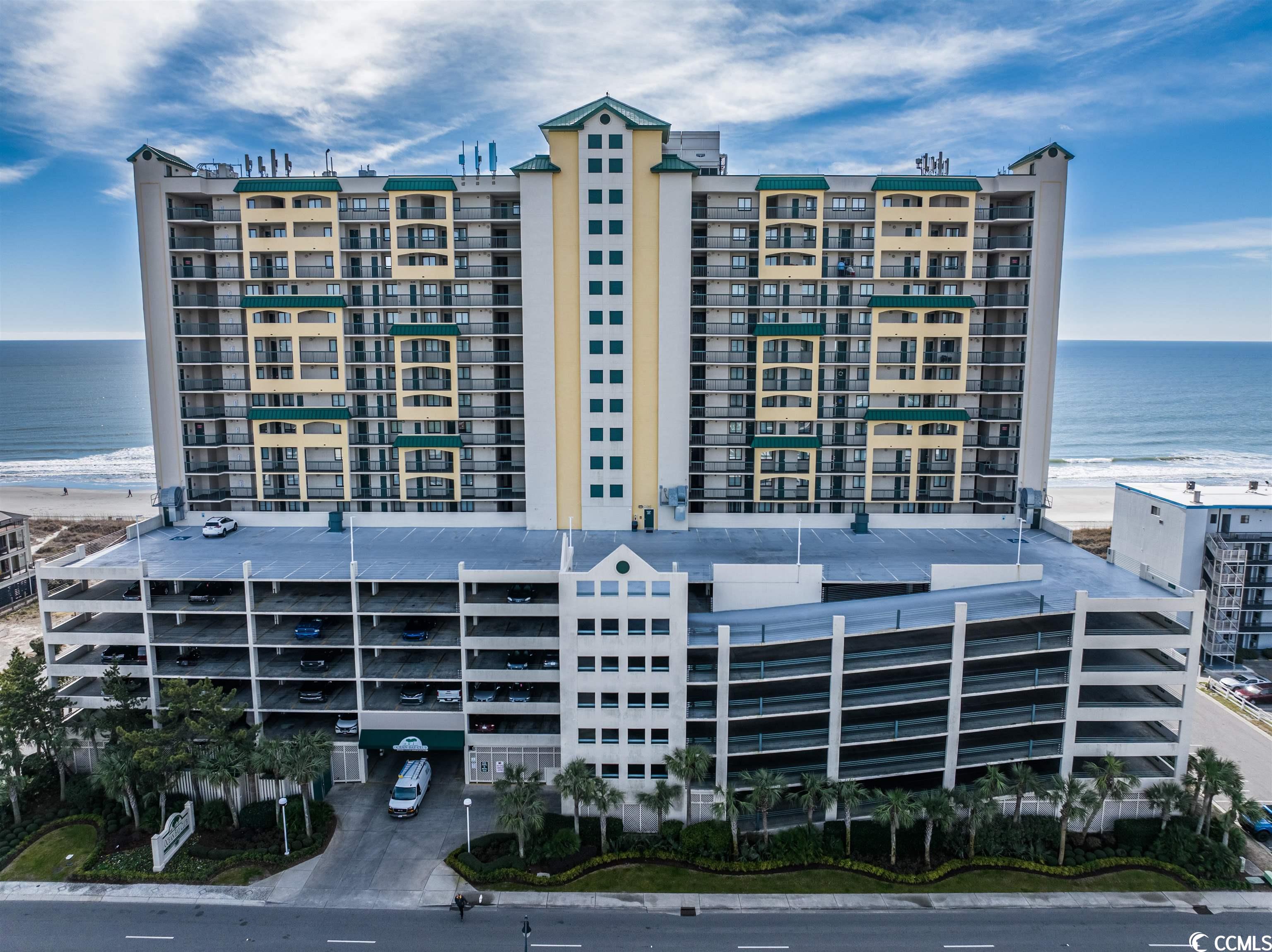 welcome to this luxuriously appointed oceanfront condo in one of the preferred complexes on the beach. located near main street in downtown north myrtle beach, this beautiful condo is offered fully furnished and is move in ready. there are four spacious bedrooms featuring a king bedroom suite in master and three queen sized beds in the others. there are three bathrooms; one adjacent to the master that comes with a jacuzzi and walk in shower, one with the second bedroom and one is shared with the other two bedrooms. to make it more comfortable there are ceiling fans in all rooms.   a real plus is the tile flooring throughout this 1737 sf unit, which helps with sandy accumulations after a long day on the beach. and what else is needed...a full sized washer and dryer to help with the wet clothes and towels you bring from the shore. another feature that will capture your attention is the tasteful artwork throughout. the glass top table and six chairs look as though they've never been used. the living area has a supple brown leather sleeper sofa with matching loveseat and chair with an ottoman as well as a  navy blue leather glider rocker with ottoman and big screen tv. on the balcony there are two new adirondack chairs that beckon you to sit and watch the sun rise or enjoy a cold beverage as the sun sets. by the way, this 12th floor unit comes with panoramic ocean views.  in addition, there is an outside storage closet next to the front door. don't hesitate to move on this one, it won't be available long. call with questions.
