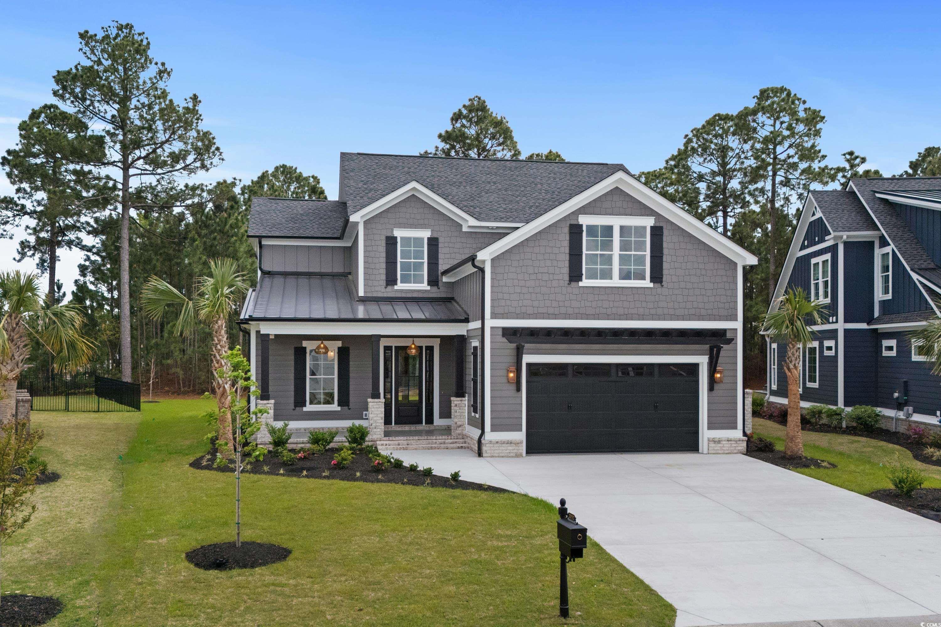 discover your dream home at 2052 summer rose lane, myrtle beach, sc 29579, perfectly situated in the prestigious waterbridge community within carolina forest—myrtle beach's rapidly expanding area. this newly constructed marvel offers 3,640 sq ft of heated living area and a total of 4,603 sq ft, marrying modern sophistication with traditional southern elegance. the main level showcases a splendid master suite with beam ceilings and a luxurious bathroom featuring a floor-to-ceiling tiled shower. this level also hosts an additional bedroom, a home office, and a chef's dream kitchen with custom cabinets, a unique range hood, wall oven with convection microwave, slide-in gas range, and an additional electric stove. a bar area with a beverage center rounds out the culinary space. upstairs, find three more bedrooms, a versatile bonus room, a flex room, and ample attic storage. the home is adorned with engineered hardwood floors throughout and tile in all wet areas, reflecting its quality and style. the convenience is further enhanced by a spacious laundry room with extensive cabinets and an oversized two-car garage with epoxy flooring. living in waterbridge affords access to top-tier amenities, including south carolina's second-largest residential pool, lazy rivers, tennis and volleyball courts, pickleball, a well-equipped gym, and a 60-acre freshwater lake. embrace unparalleled living in the heart of myrtle beach at 2052 summer rose lane—your ultimate forever home.