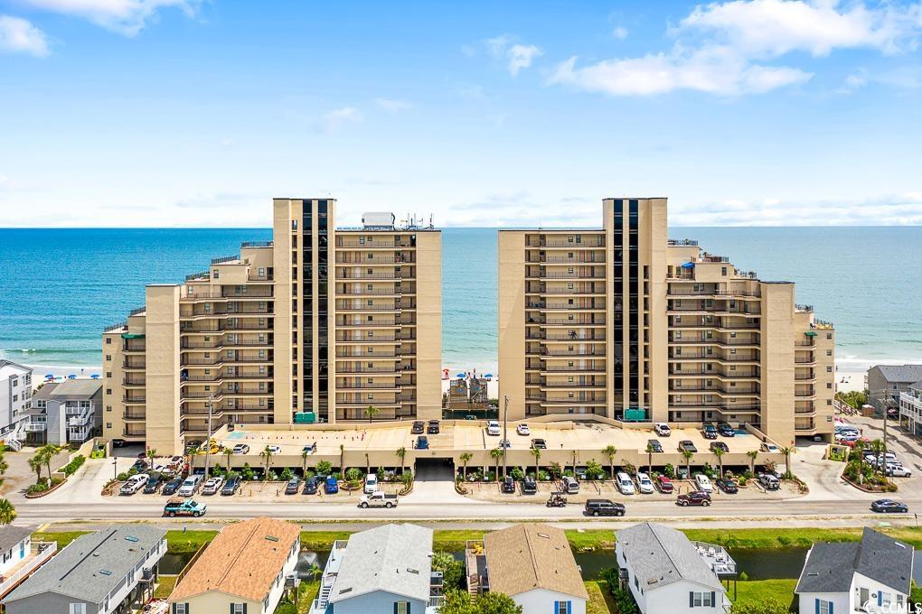 this roomy 2 bedroom, 2 bathroom condo boasts 1250 sf and is located oceanfront in garden city beach's desirable surfmaster complex. tenth floor location allows for unsurpassed beach and ocean views. this updated unit features tile plank flooring throughout, a redesigned enlarged kitchen, shaker-style kitchen cabinets, granite kitchen countertops, tile backsplash, stainless steel appliances, custom tile showers, granite vanities, and much more.  turnkey unit with modern coastal decor and furnishings is being sold fully furnished, rental ready to accommodate 7 guests (1 king bed, 1 queen bed, 1 single bed, 1 sleeper sofa). surfmaster is a well-maintained building with resort-style amenities. minutes from shopping, restaurants, golf courses, attractions, and live entertainment.  act quick and schedule your showing today as this unit will not last long!