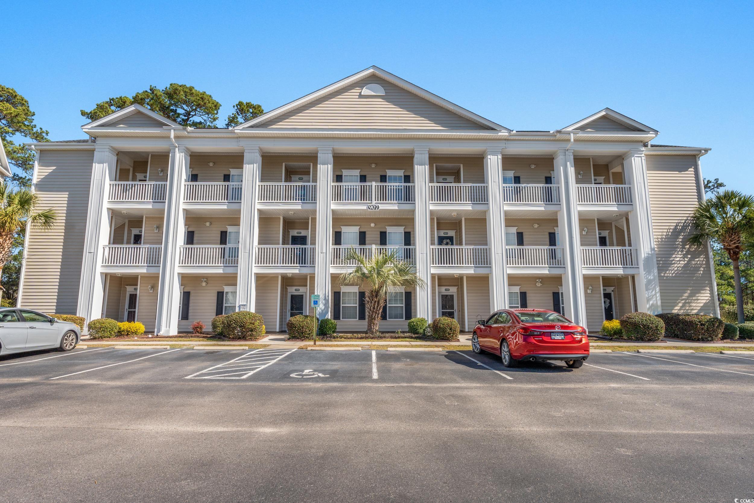 nestled in the beautiful international club of myrtle beach, this beautiful partially furnished, end unit, 2-bedroom, 2-bathroom condo offers breathtaking views of the 13th green. this spacious home features an open floor plan with vaulted ceilings and large windows that provide plenty of natural light. the kitchen is equipped with new stainless steel appliances, and a breakfast bar. the master suite boasts a spacious walk in closet and ensuite bathroom.  the screened in porch is perfect for outdoor entertaining. this unit is located in a gated community. new lvp flooring and paint, hvac was replaced in 2022, water heater in 2021 and roof in 2020.