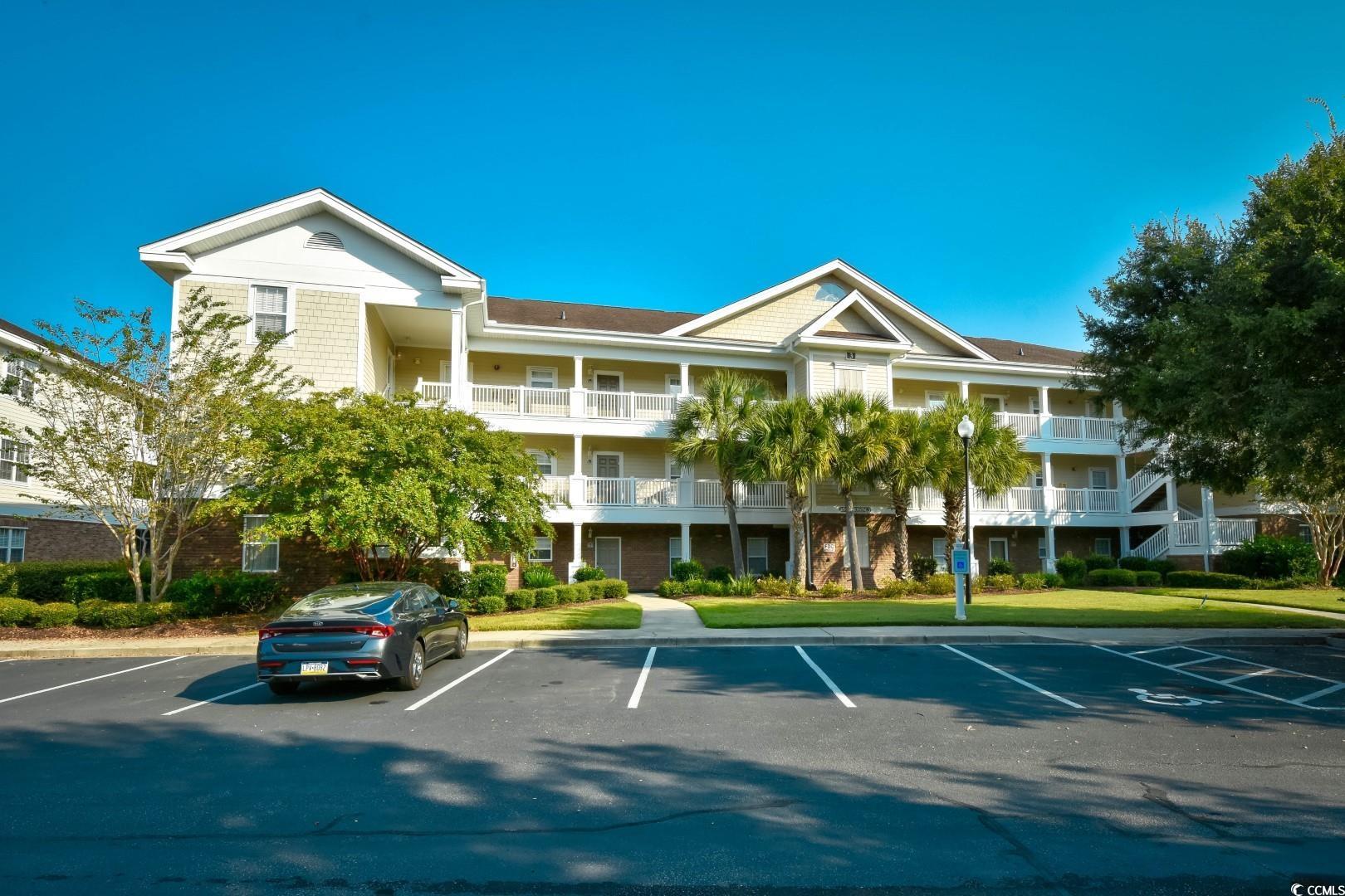 welcome home to this 2nd floor, 2 bedroom, 2 bathroom unit in the highly sought after, gated community of river crossing at barefoot resort. this unit features an open floor plan of the main living areas with freshly cleaned carpets in each bedroom. the kitchen is equipped with all appliances, an open window looking into the living and dining areas, and plenty of cabinet and counter space. each bedroom includes a spacious closet and easy access to its own bathroom, while the master also includes a walk in closet, linen closet, and a view of the pond! washer/dryer included with sale for even more added convenience. spend your afternoons relaxing on your balcony with a view of the pond and an additional storage room, or socializing with neighbors at the many barefoot amenities. river crossing owners can enjoy access to all of the barefoot amenities, including outdoor pools, clubhouse, tennis courts, oceanfront cabana, members club, and more! since this unit is listed with a century 21 barefoot agent, you are eligible for a discounted membership! whether you are looking for your forever home, a second home near the beach, or your next investment opportunity, you won't want to miss this; schedule your showing today!