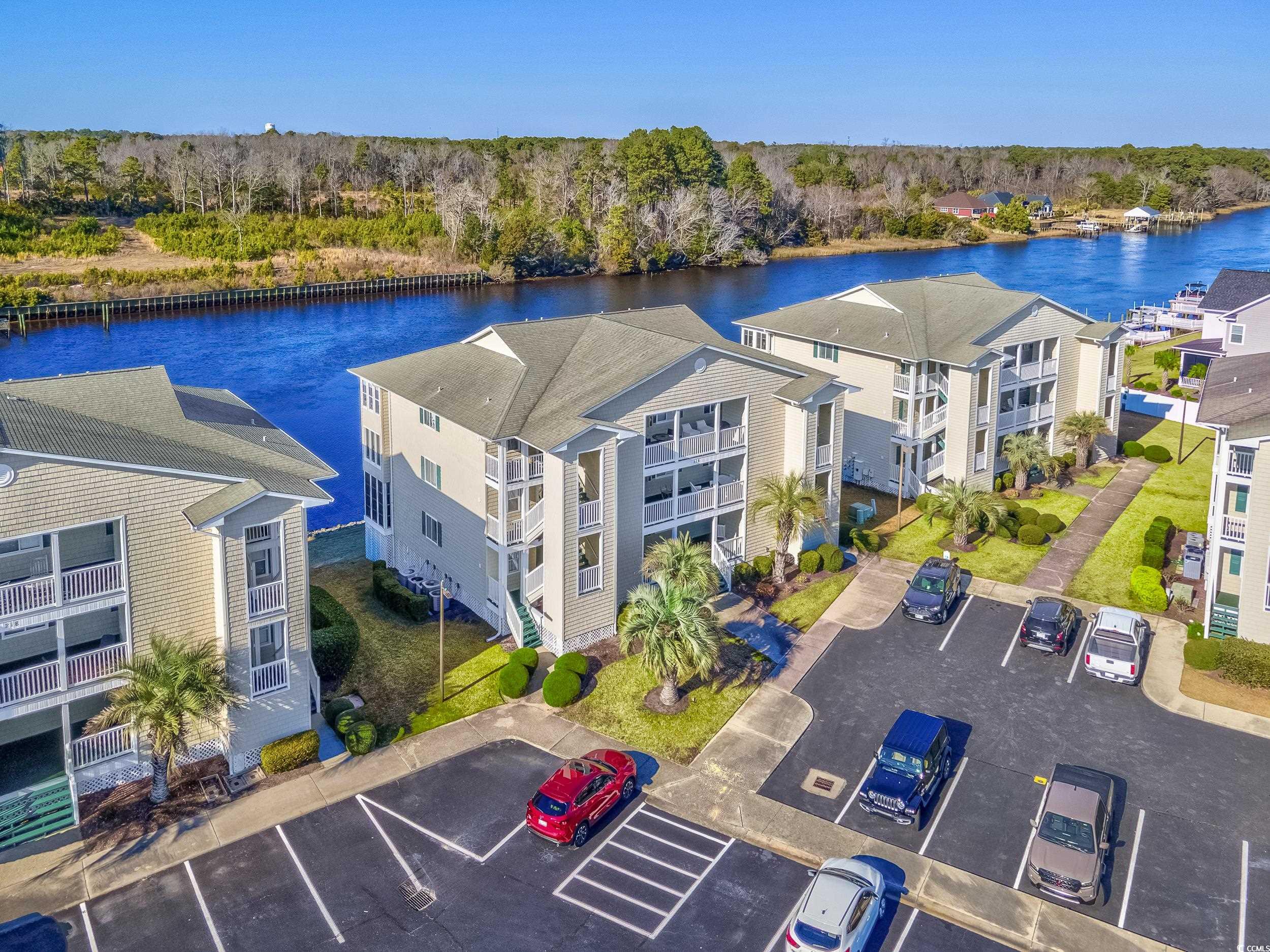 enjoy direct views of the intercostal waterway from this nicely updated and fully furnished 1st floor 2 bedroom 2 bath condo in the heart of north myrtle beach!  enjoy beautiful sunsets overlooking the intercostal waterway from the spacious screened porch featuring ez-breeze windows and ceiling fan. beautiful luxury vinyl plank flooring flows throughout all rooms of the condo.  custom window treatment moldings adorn all the windows and sliding door openings. beautiful modern furniture and beach themed decor compliment the stunning waterway views of this condo. the updated kitchen features quartz countertops,  new stainless steel appliances and modern fixtures.  the master bedroom has its own sliding glass door leading out to the screened porch as well as a ceiling fan and a walk in closet.  the master bath features a walk in shower, framed mirror and sink with quartz countertop.  the guest bath also features quartz countertops and updated fixtures. the hvac system was replaced in 2022!  located in the desirable waterway landing community of north myrtle beach, residents can enjoy access to two outdoor pools, hot tub, waterfront piers w/picnic tables and convenient proximity to local amenities. don't miss the chance to own this exquisite waterfront retreat – schedule a showing today before it's gone!