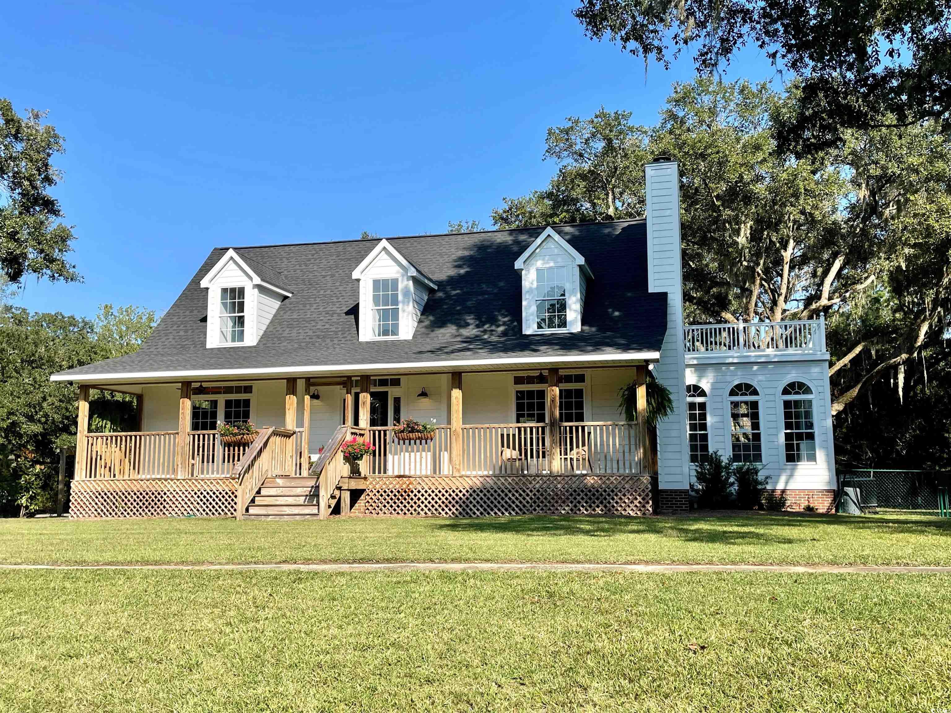 spectacular old live oaks and mature palms tower over a beautiful fully remodeled low country home in the heart of pawleys island on a main riverfront channel with direct access to the intracoastal waterway; and not in a flood plain.  this property is located just north of the original all saints church off kings river road and remains to boast the history of "days gone by."  the surrounding privacy and quietude presents a special residence that enjoys natural protection and a revered position along the waccamaw river - where a sense of adventure and expectation abounds.  new hardi plank siding, new roof, new flooring, new kitchen, all new appliances, plumbing and electrical; plus covered gazebo and a 30 foot long dock walkway.  come see for yourself to experience a unique awakening of your lowcountry imagination as this rare home ownership opportunity awaits!