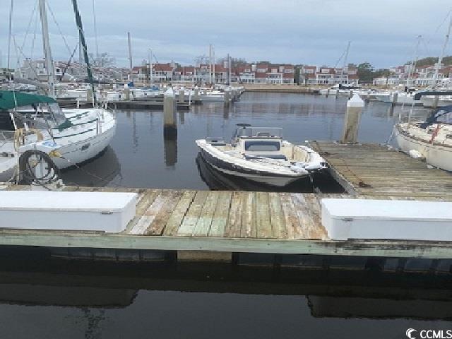 35' deeded boat slip in charming mariner's pointe in little river.  small gated private marina/condo community with 116 individually deeded boat slips and 146 separately deeded condos.  basic cable, internet, electric, water, trash included in hoa fees. showers, clubhouse, bar, pool, hot tub, basketball, pickle ball, and tennis courts.  close proximity and easy access to the atlantic ocean (no bridges).  historic little river fishing village just blocks away with restaurants, shopping, and fishing!  golf and entertainment nearby.  just minutes to the beach!  measurements are approximate and not guaranteed.  buyer is responsible for verification.