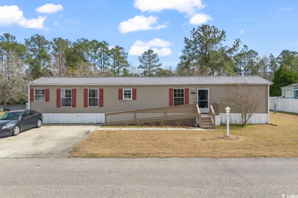 don't miss this opportunity to own this 2 bedroom, 2 bathroom 16x66 2006 destiny-model home in the quiet community, conway plantation! this home is located within a very well maintained community with reasonably priced lot-rent fees that include access to the community pool, kids playground, basketball court  and is pet friendly! the home itself features laminate flooring throughout the main living areas with cozy carpets in the bedrooms, and a full kitchen equipped with all appliances! other upgrades include a moisture barrier under the house, metal roof, termite bond, upgraded and well manicured landscaping, and a large attached storage shed that conveys with sale. enjoy afternoons relaxing on your huge back deck with an incredible view of the pond and an extended concrete patio, or socializing with friendly neighbors at the community amenities. located close to all of the grand strand's finest dining, shopping, golf and entertainment attractions, just minutes from the colleges and the famous conway riverwalk! you won't want to miss this. schedule your showing today!