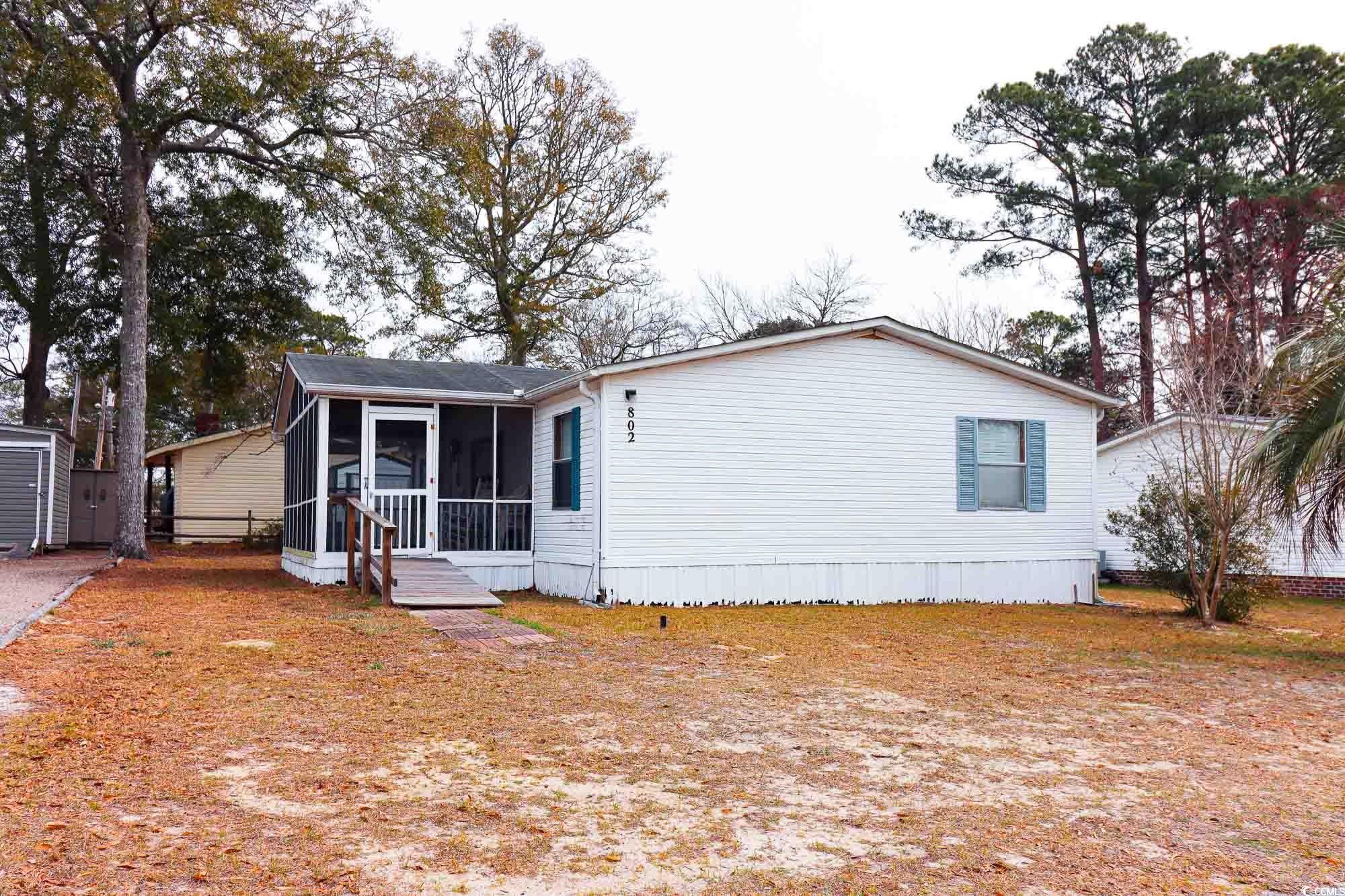 welcome to 802 lowe dr, a charming 3-bedroom, 2-bathroom home nestled in the heart of the grove community in north myrtle beach. this residence boasts a rare gem in the real estate market – no hoa fees, allowing you to enjoy the benefits of homeownership without the additional costs. as you step inside, the open living room immediately welcomes you, offering an easy and seamless flow throughout the entire home. the well-designed kitchen features an abundance of counter space and ample cabinet storage for all your kitchen essentials. the master suite is a retreat within itself, showcasing a spacious walk-in closet, a double sink vanity, and a roomy shower. convenience is key with a dedicated laundry room that comes with a separate entrance, adding a practical touch to your daily routine. step outside onto the screened-in porch, a perfect spot for entertaining guests or simply unwinding while enjoying the sights and sounds of the friendly neighborhood. additionally, the property comes complete with two large storage sheds, ensuring you have ample space for all your storage needs. strategically located near hwy 9, this residence offers easy access to cherry grove beach, the intracoastal waterway, barefoot landing, tanger on 17, as well as a variety of great golfing, shopping, dining, and entertainment options. embrace the coastal lifestyle and make 802 lowe dr your new home, where convenience, comfort, and a sense of community come together seamlessly. book your showing today!