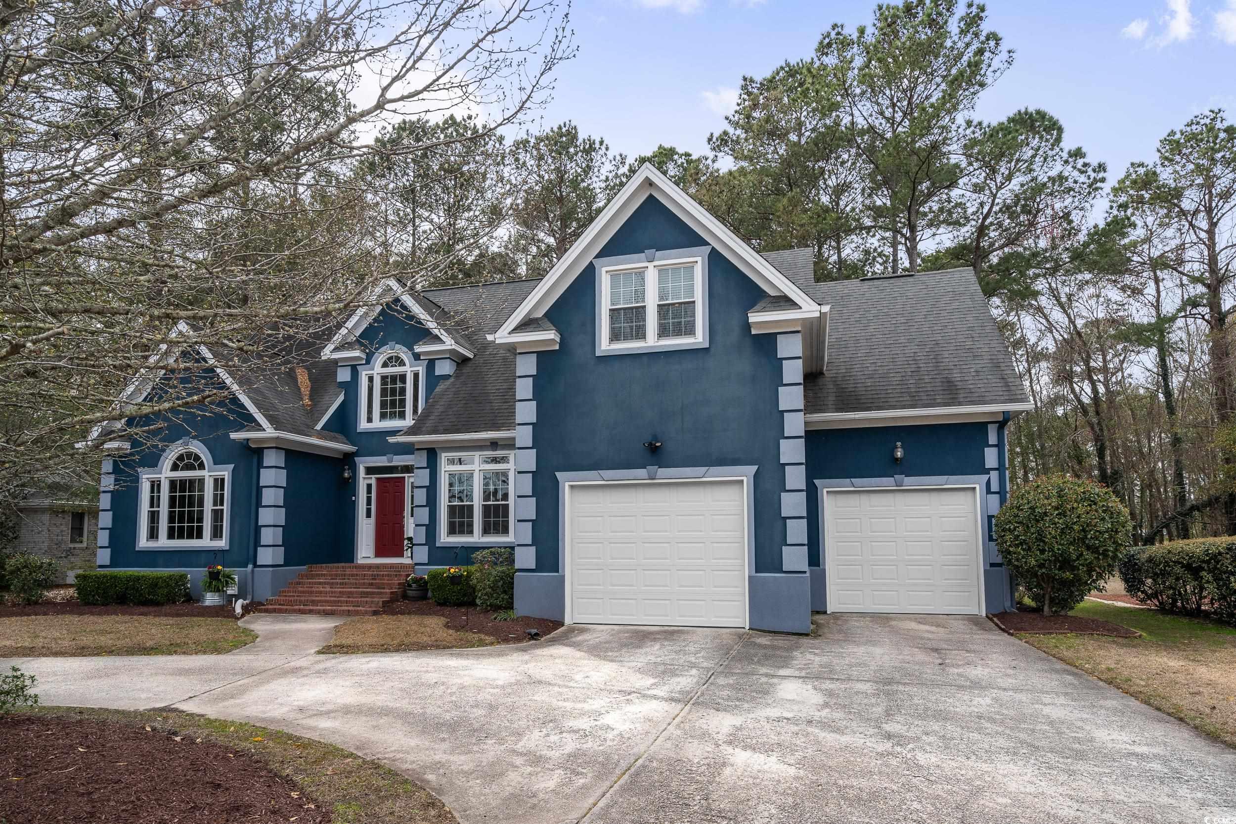 gorgeous home on the golf course, within 2 miles of the beach! located in the highly desired murrells inlet community of indigo creek golf plantation. this custom stucco home offers 4 bedrooms, 3 1/2 bathrooms, mature landscaping, tons of storage, 2-car garage, circle drive for extra parking, large yard & deck with golf course views! step into your grand foyer revealing a beautiful wood staircase and open concept with catwalk views...perfect for photo opportunities! the spacious living room has new flooring, high vaulted ceilings & a wall of windows and doors that add a ton of natural light, a generous space providing multiple options for furniture placement. through the living room you will see the well appointed kitchen with large work island & cooktop, wall oven, large stainless steel sink, granite countertops, tiled backsplash, ample cabinet storage & pantry, allows room for 2 or 3 to be in the kitchen at the same time cooking and prepping for your family or guests! off the kitchen is a laundry room with sink & access to your 2-car garage. the formal dining room with tray ceiling and large windows could also be used as a home office, it has double glass doors & pocket door to close off for privacy. primary suite is located on the 1st floor, the ensuite bathroom feels roomy & spa like with its large double vanity, walk-in shower, large jacuzzi tub, 2 walk-in closets & linen closets. second floor features catwalk overlooking the foyer & living room, 2nd bedroom with private bathroom, 3rd bedroom or family room, 4th bedroom and oversized storage closets with office or exercise room potential. unwind & relax on your back deck enjoying the carolina skies, wildlife and golf views! community features include a clubhouse, golfing & pool. close proximity to the famous murrells inlet marsh walk, garden city & surfside beach, mb airport, medical facilities, restaurants, golfing, shopping, dining, entertainment...all the grand strand has to offer! this home has so many possibilities! don't let this opportunity slip away! call to schedule your showing today!