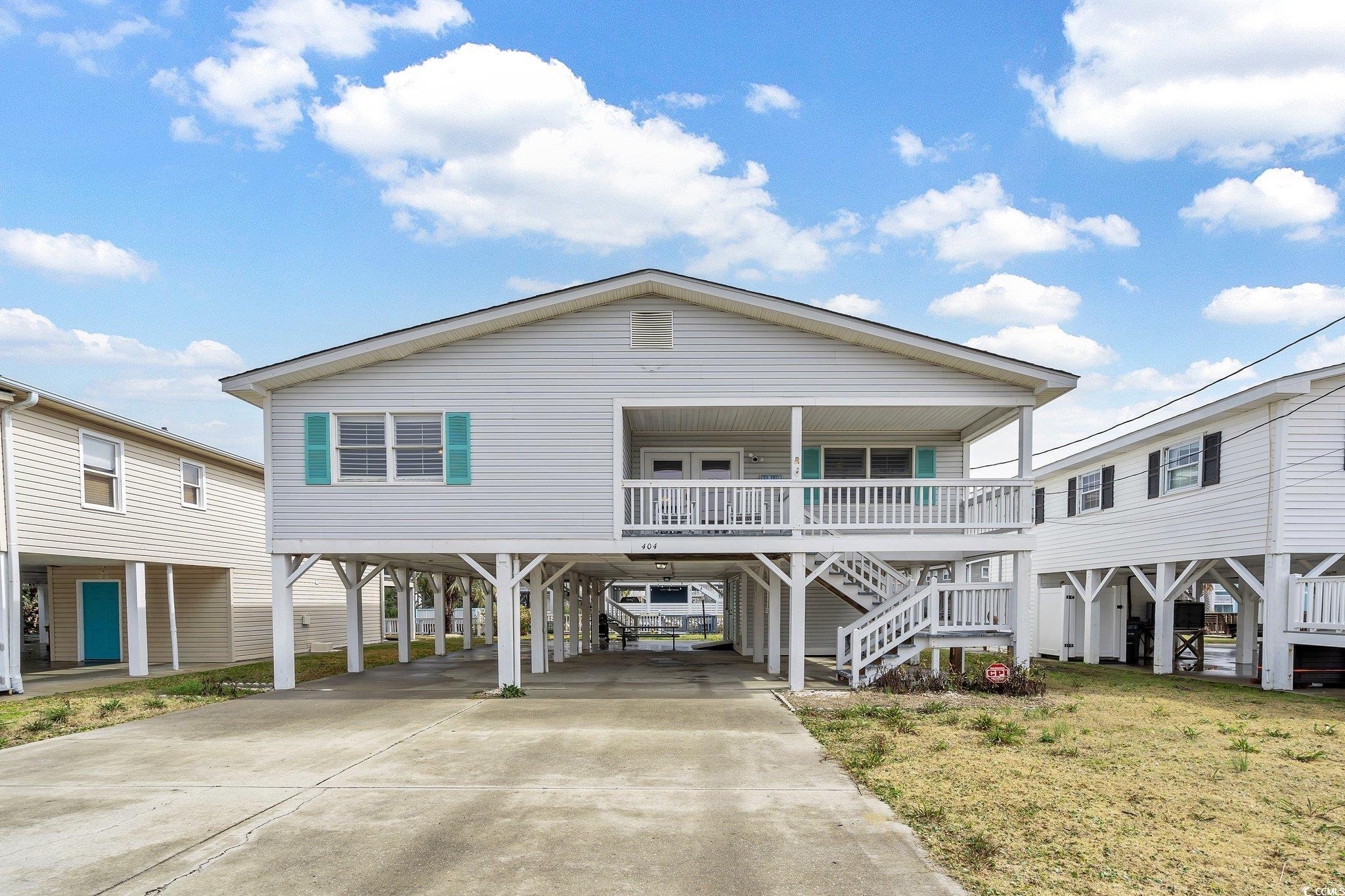 this is the perfect home, second home or airbnb!  nestled along a channel in cherry grove beach, you have gorgeous views of the water.   the serene backyard is ideal for fishing, crabbing and kayaking and is big enough to accommodate a pool.  this raised beach home boasts 4 bedrooms and 3 full baths including a spacious master bedroom with private on suite bath.  one of the best features of this home is the location!  just .3 miles from the beach and .4 miles from the cherry grove fishing pier!  just .5 miles from sea mountain highway which has many shops and restaurants for you to enjoy.  updated, fully furnished and perfectly decorated for a 5 star airbnb, this home is completely turn key!  there are two locked owners closets so your personal items can be conveniently enjoyed when you visit.  below the home is an outdoor shower and storage space for a golf cart and all of your beach gear.  there is also a private fishing dock right out back.  you will love that the roof was installed in 2016, hvac in 2017 and water heater in 2022.  be sure to check out the immersive 3d tour and don’t miss out on this gem!  don't wait! - schedule a showing before this gorgeous home is sold!
