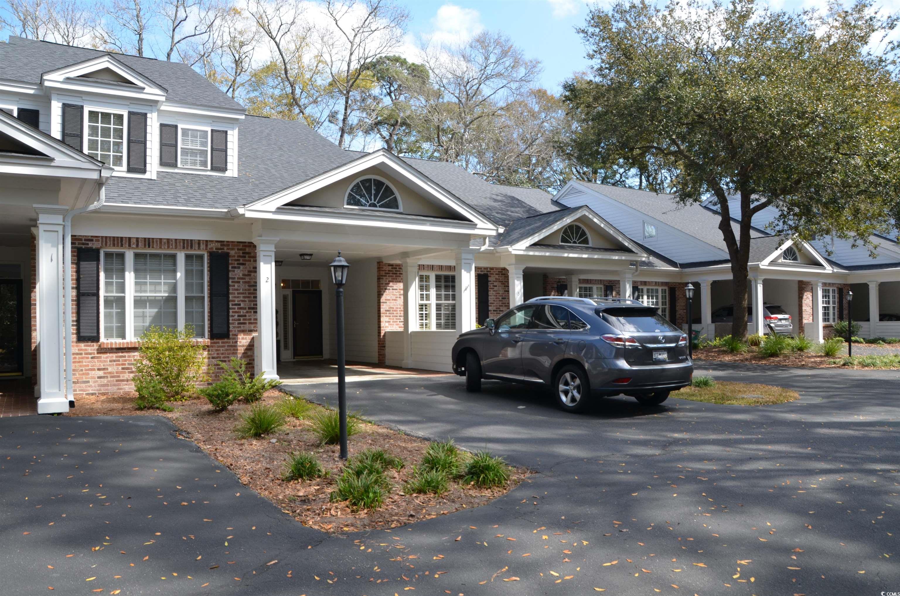 this is a beautiful townhome on the 15th hole of the jack nicklaus signature golf course at pawleys plantation. enjoy the beautiful view of the pond and golf course while relaxing on the screened porch or from the living room and dining area. there are 2 master suites, one on the main level and the other on the 2nd floor. there is a 3rd bedroom and all bedrooms have their own bathroom. also an additional "sitting room" area on the 2nd floor perfect for guests to relax or use as an office. plenty of storage space upstairs for all your holiday decor. the kitchen offers stainless appliances, corian counters with a new dishwasher in 2023. floors in the living, dining, hall and stairs have been updated with lvp. new paver patio off the screened porch with a new brick floor in the porch. updated light fixtures as well. the carport area has a storage closet for your beach chairs and golf clubs. pawleys plantation offers golf and social memberships for the amenities. pawleys plantation is a beautiful gated community just minutes to the gorgeous beaches of pawleys island and litchfield. so many wonderful restaurants and shopping and don't forget charleston is an easy drive, 90 minutes downtown or 60 minutes to mt pleasant for some serious shopping! myrtle beach airport is also 40 minutes north for your travel needs!