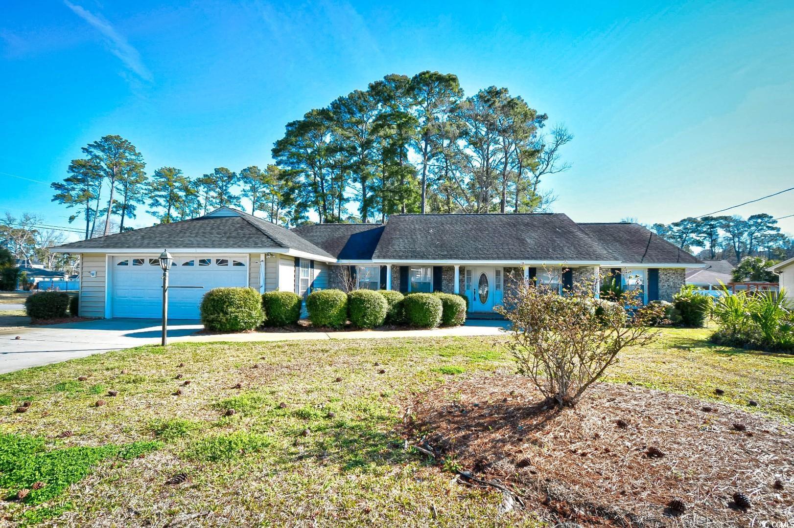 don't miss this one of a kind- 4 bedroom 2.5 bathroom home with a private pool and hot tub in the backyard, located on 26th ave right in the heart of north myrtle beach. this home features laminate flooring throughout the main living areas with a beautiful brick fireplace as a main focal point. the kitchen is equipped with all appliances and leads to the den area that offers additional cabinet & counter space with a bar area for entertaining! each bedroom offers plenty of closet space and easy access to a bathroom, while a half bath adds ease and convenience for guests. a carolina room makes the perfect additional living space and leads to the oasis of a backyard. spend your days floating in the fiberglass-saltwater pool, and in the evenings relax in the hot tub, all within the privacy of your large fenced in backyard. perfectly situated in a highly sought after area of north myrtle, with no hoa, and close to schools, grocery stores, and all of the grand strand's finest dining, shopping, golf, and entertainment attractions, with just a short 10 minute drive to the beach. you won't want to miss this. schedule your showing today!