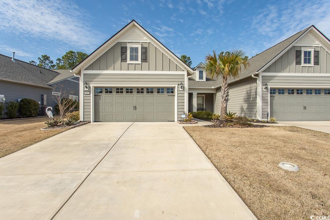 welcome to the prestigious 55+ community of del webb grande dunes of myrtle beach. this beautiful and practical cressida floor plan showcases the many features that this wonderful home has to offer. sitting on a private lot backed to the woods you enter a home with new luxury vinyl plank flooring throughout. the inviting entrance leads past the flex room and into the open area highlighted by a modern kitchen with granite countertops and stainless steel appliances. the upgraded light fixtures and ceiling fans compliments the wonderful décor of this home. the owner’s suite offers an en suite bathroom and a useful closet organizer. enjoy your screened-in porch and patio space for entertaining. this home is beautifully landscaped and is protected by a ring alarm system and has a nest thermostat. the villa’s hoa offers lawn care and many luxury amenities including: indoor and outdoor swimming pool at the amenity center, tennis and pickleball courts, bocce ball, fitness center, marina access, vip private access to the grande dunes ocean club featuring a pool with cafeteria and onsite restaurant.