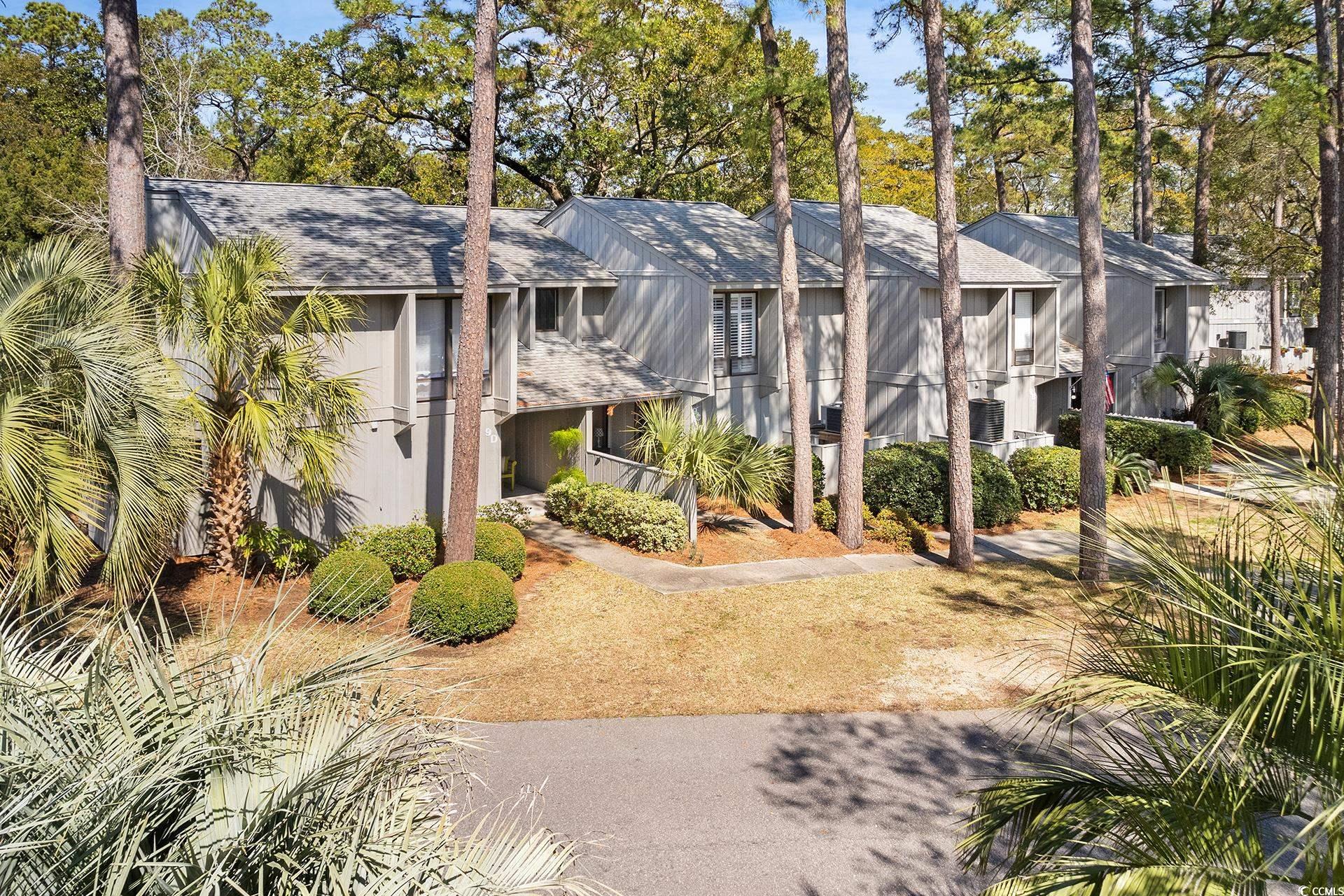his charming end unit has been updated and boasts a delightful appeal, situated within the inviting community of salt marsh cove in pawleys island. nestled in the heart of pawleys island, this unit offers access to a host of amenities including a community pool, clubhouse, creek dock, and boat storage. enjoy the convenience of being just moments away from pristine beaches, renowned golf courses, quaint boutiques, and enticing dining options. featuring three bedrooms, this unit showcases a brand-new kitchen and two bathrooms upstairs, leaving the downstairs perfect for entertaining guests. a spacious laundry room adds functionality, enhanced by eye-catching wallpaper that imbues the unit with its own unique character. outdoor living is embraced with tiled front and back porches, providing ample space for relaxation. abundant storage ensures ample room for all your belongings. welcome to your new home in the charming town of pawleys island, sc.