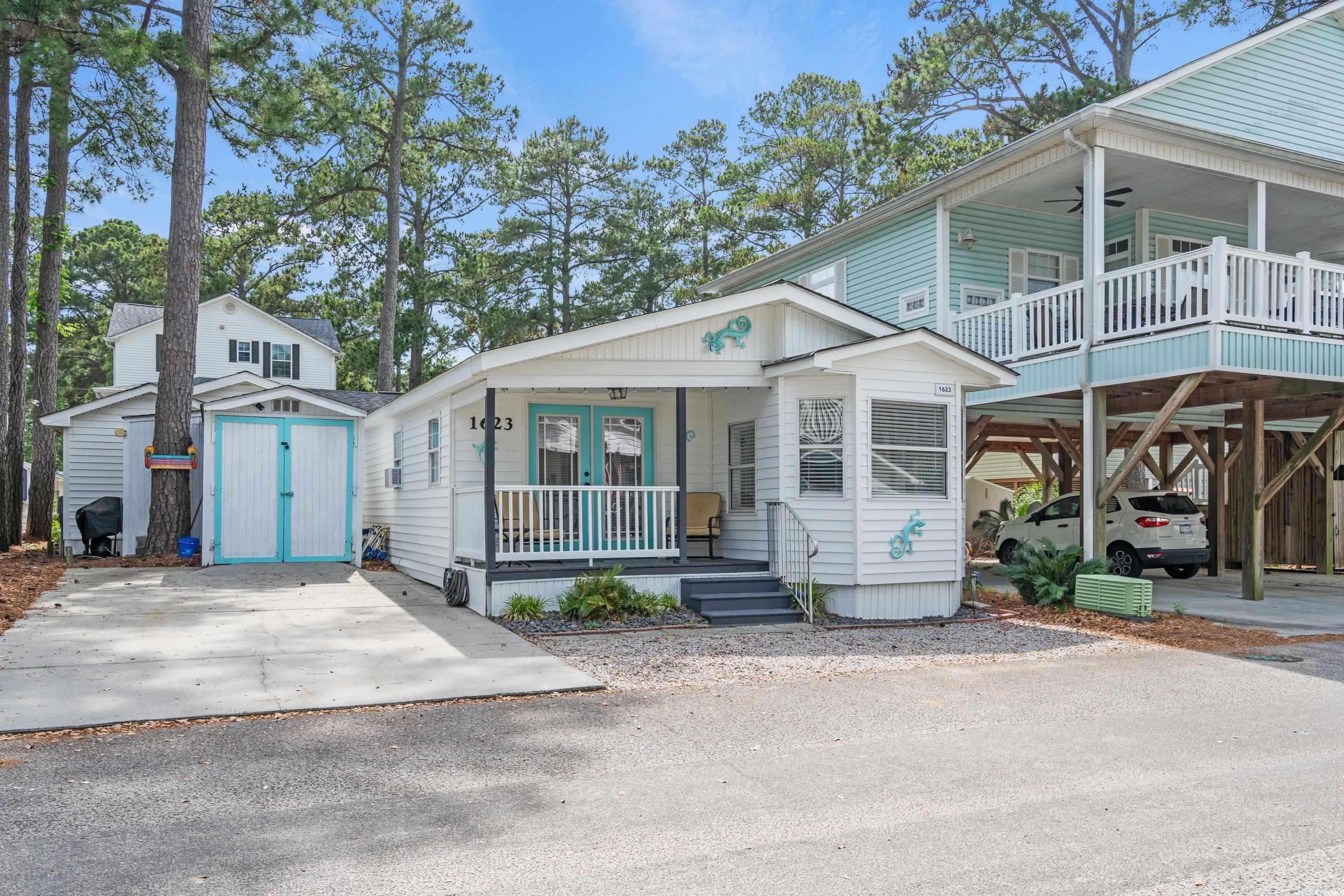 motivated seller. welcome to your coastal retreat at ocean lakes campground, the premier vacation community. we present a recently remodeled gem boasting 2 bedrooms, 1 full bathroom, and 1 half bathroom, ensuring comfort and style for your beachside escape. the living area provides a perfect spot to unwind, offering a harmonious balance of natural light and coastal vibes. retreat to the master bedroom, which is just off the family room, with no steps to contend with. the second bedroom is versatile, ideal for guests or transforming into a home office for remote work with a view of the lush surroundings.  as a resident of ocean lakes, you'll enjoy an array of amenities that make everyday life feel like a vacation. dive into fun at the water park, perfect for family outings and cooling off on warm summer days. rest easy with 24/7 security, providing peace of mind for you and your loved ones.  indulge in the beauty of nature with a full mile of community beach access just steps away. whether you're a beachcomber, sunbather, or surfer, the pristine shores are your playground. challenge guests to a round of mini golf or grab essentials at the convenient on-site mini-mart.