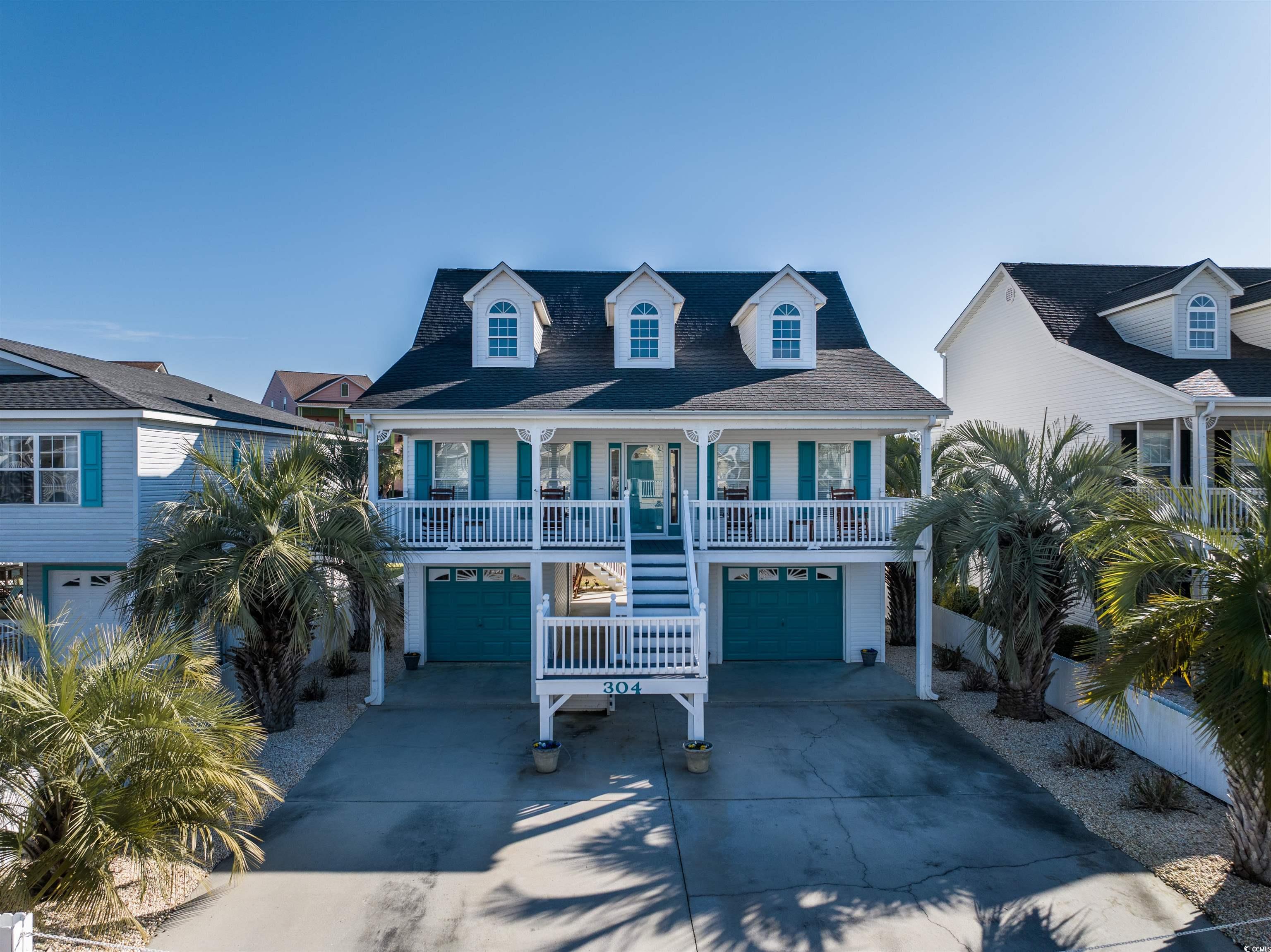 introducing the coastal paradise in cherry grove that you have been looking for. this 4 bedroom, 3 full and 2 half bath gem with fresh paint interior and exterior, is a custom built, one owner home offering comfort and style. the home with no dredge fees, view of the ocean and view of hog inlet, and has never been rented, is a rare find.  home features open concept connecting living area with high ceilings, dining and kitchen areas to allow space for entertaining or large families. granite countertops were installed in kitchen in 2023, new kitchen appliances in 2020, storage room appliances are 2022 washer, dryer and refrigerator. roof and ac unit was replaced in 2016. large master ensuite with his and hers closets, double vanity, garden tub and linen closet. the windows are adorned with custom 2" wood blinds. step out to the spacious screened in porch and relax as you enjoy the sea breeze. the beautiful oak stairway leads up stairs to three bedrooms (owner currently using one for storage) and two full baths.   step out on rear balcony upstairs for a view of the ocean, inlet or the beauty of your own backyard.  there is plenty of room to install your own private swimming pool in the rear. if you are looking for lots of storage, this home has a 14'x21' storage with a 9' remote garage door and a second 10'x21' storage area with 8' remote garage door. the concrete driveway and lot border is accented with fencing and decorative rocks to minimize yard maintenance.  the lush landscape is equipped with a 3-zone water sprinkler and a seperate meter. after a day on the beach, just a short golf cart ride away, you will enjoy the convenience of the enclosed outdoor shower with hot and cold water to wash the sand away before retiring to your oaisis by the sea.this home offers incredible opportunities whether you are looking for a primary residence, an investment property, or just a place for you and your family to get away to the beach and start making memories to last a lifetime. this amazing property is siuated far enough away from the crowds to allow the privacy that you desire while also only a short ride to the ammenities of the grand strand including shopping, restaurants, entertainment, etc. call today to schedule your viewing of this property you can call your home at the beach.all measurments are approximate and must be verified by buyer and/or buyer agent.