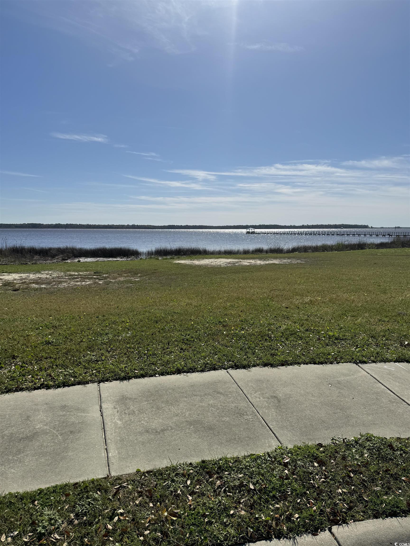 beautiful lot located in the harbor club.  this lot is waterfront on the winyah bay with spectacular views.  harbor club offers a club house, community dock and boat landing.