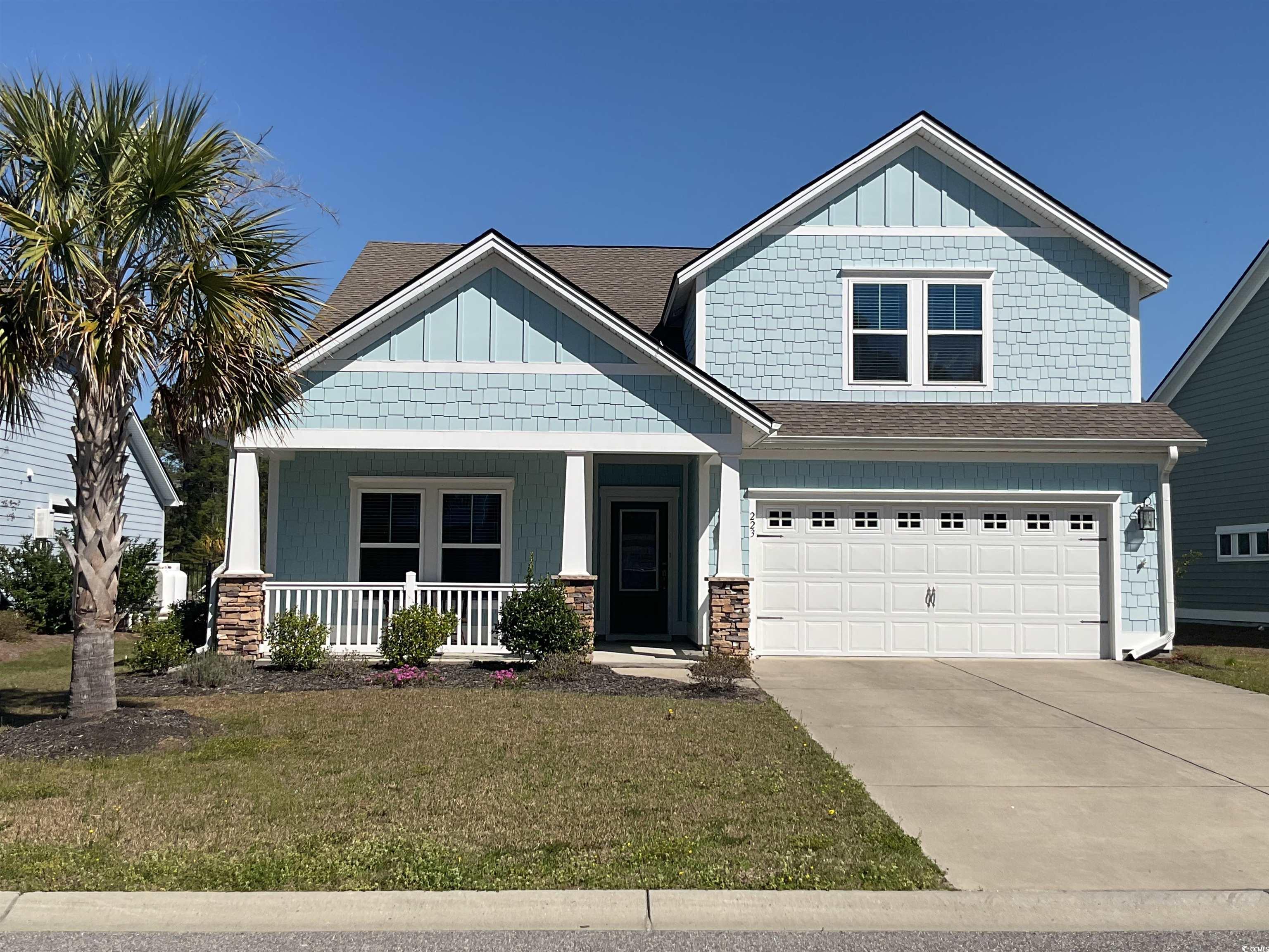 located in the colony, 223 southgate court is a charming, turnkey property in beautiful pawleys island. the home has a generous layout, ideal for a family or for hosting all guests that will naturally want to come visit your home near the beach. the living room, with its vaulted ceiling, opens to the dining area and the kitchen. complete with a bar, granite counters, stainless steel, and shiplap accents, the kitchen is top notch and ideal for entertaining. off the kitchen is a screened porch that overlooks a small lake. a perfect spot to end the day! the primary suite is also on the ground floor in addition to an attached garage.  two bedrooms and a bathroom are off of the entrance and living area.  upstairs is a large bedroom with a full bath.  this bonus space that can be used for just about anything! this is a lovely home in a beautiful setting. with tons of restaurants, shops, and great schools nearby, this home and community have much to offer. buyer and/or buyer's agent responsible for verifying lot size and square footage.